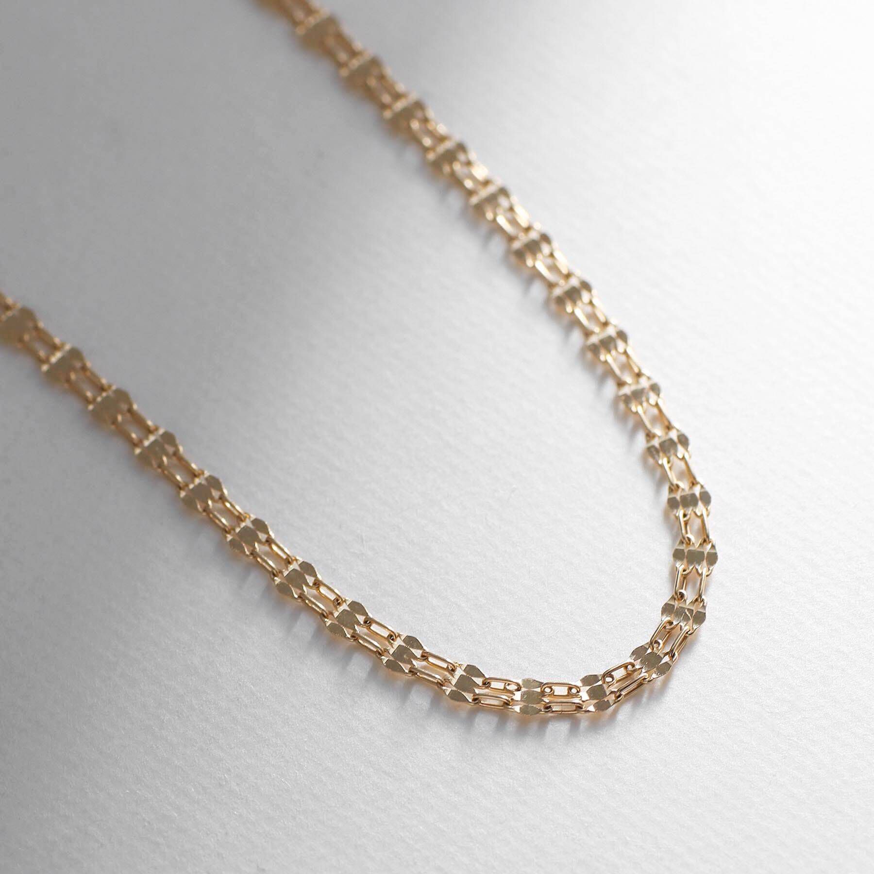 COCOSHNIK「K18ダブルフラワークロス ネックレス」|ネックレス|