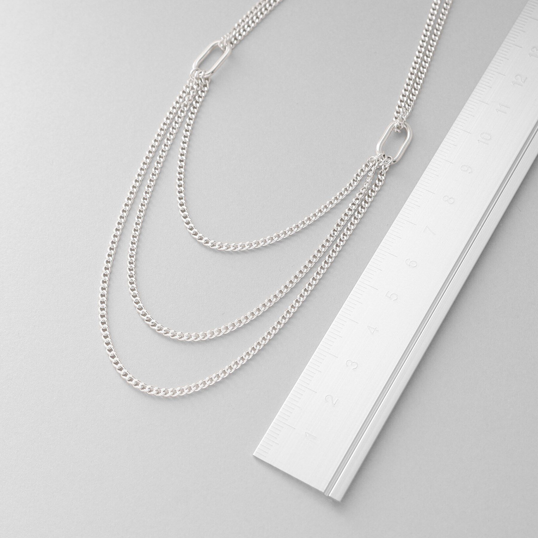 COCOSHNIK ONKITSCH「シルバー カーブチェーン ビブネックレス」|ネックレス|