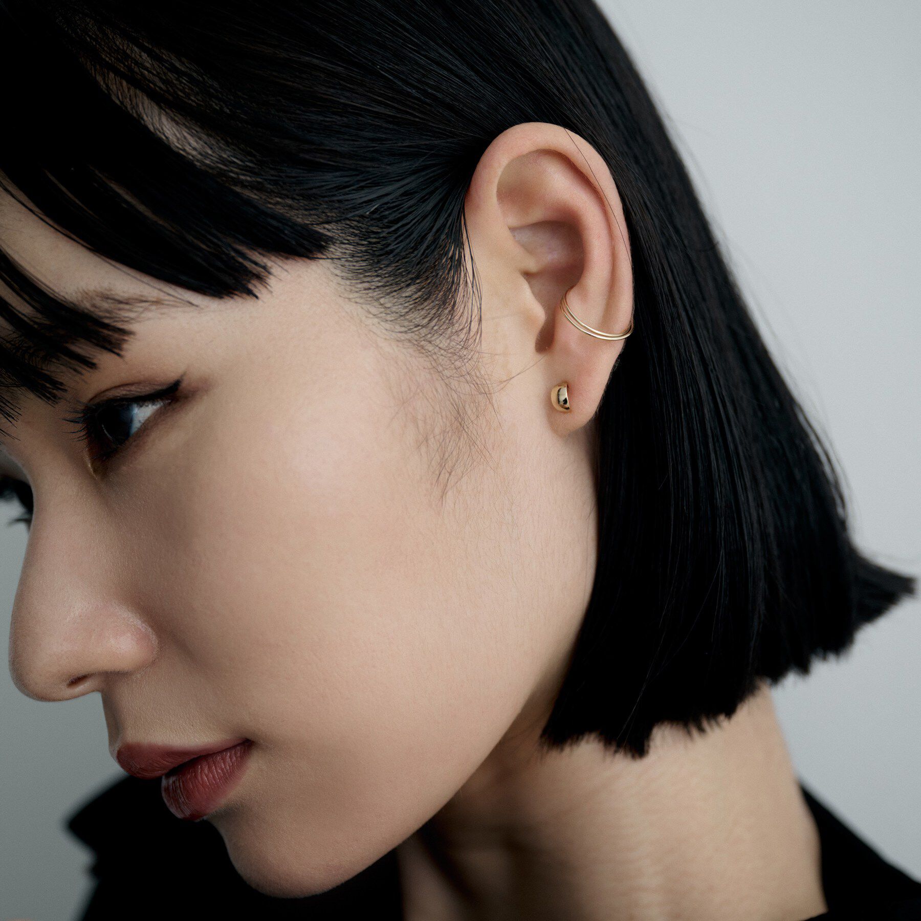 COCOSHNIK ONKITSCH「K10クロスイヤーカフ」|イヤーカフ|