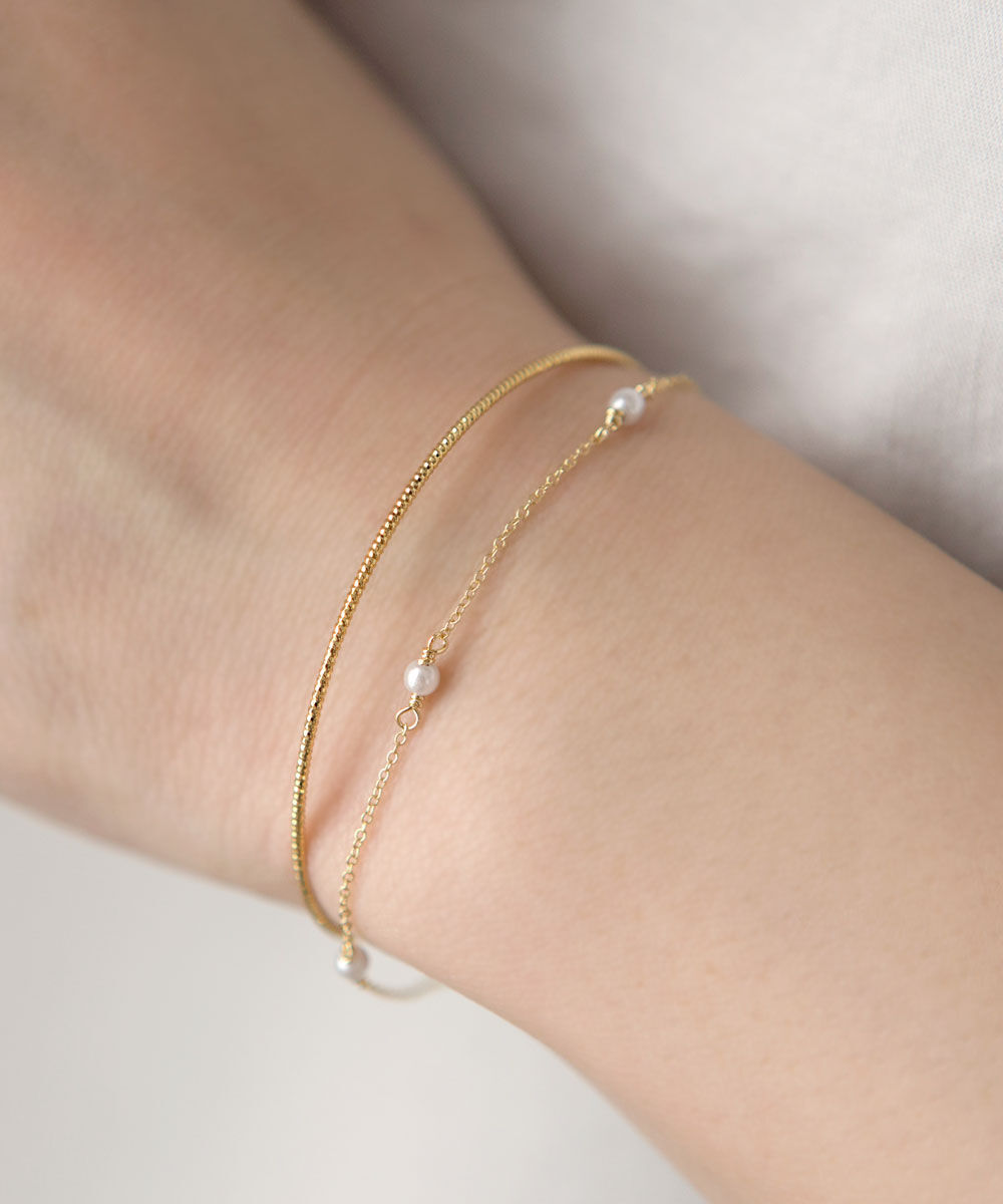 colleca la「細バングルとパール&times;チェーンのブレスレット」|ブレスレット・バングル|ゴールド