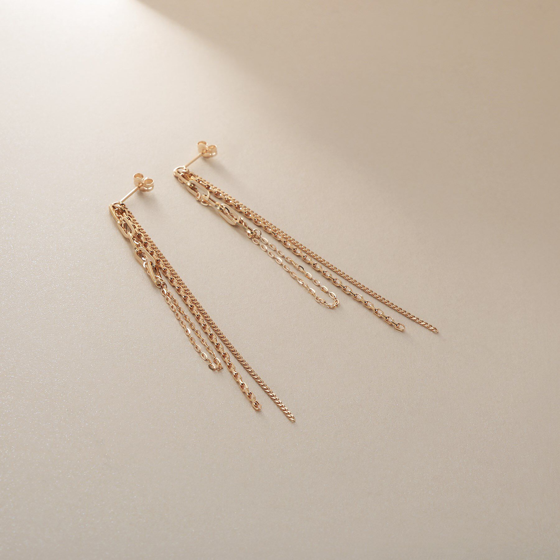 COCOSHNIK「K10ウェーブインフリンジ スタッズピアス」|ピアス|