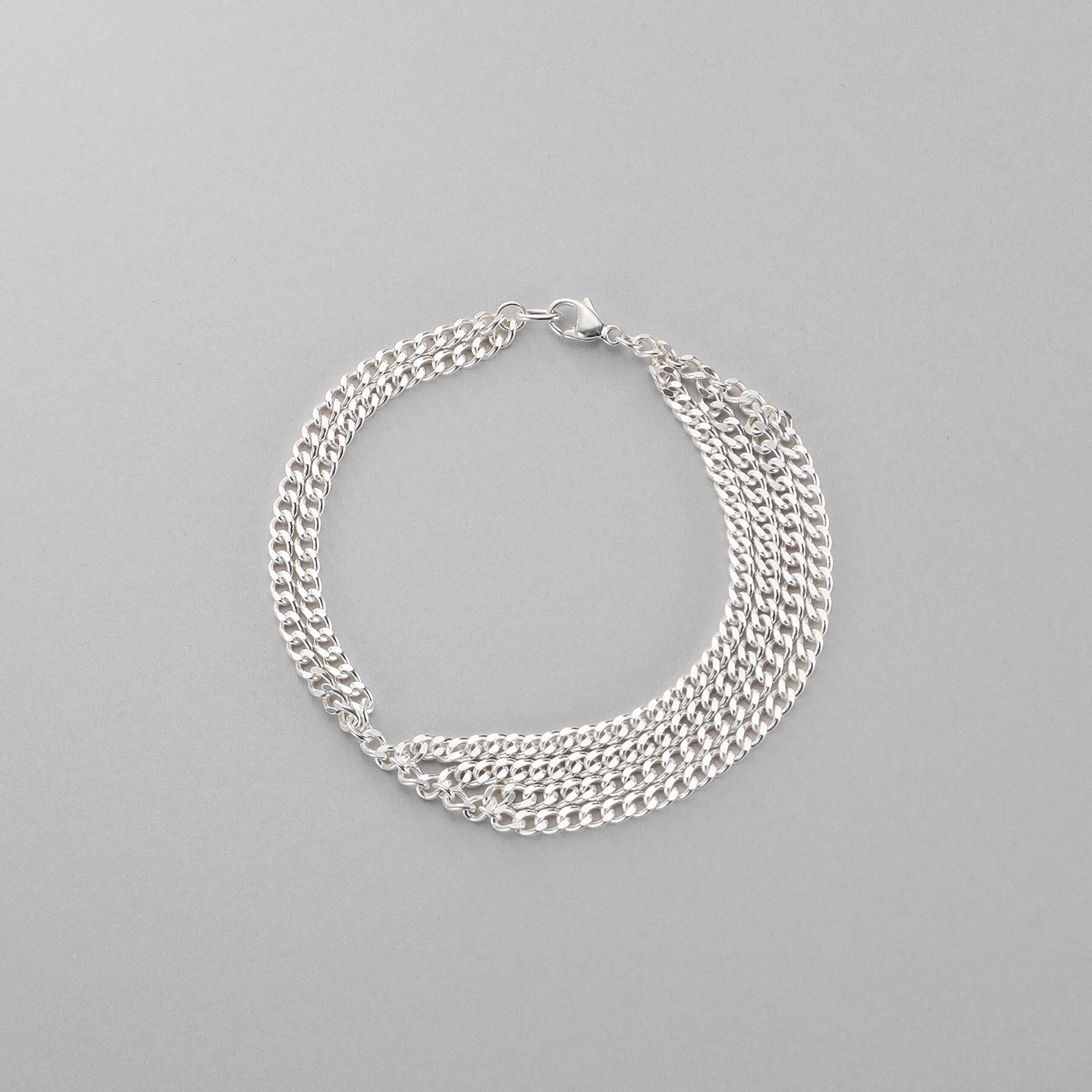 COCOSHNIK ONKITSCH「シルバー カーブチェーンアシンメトリードレープブレスレット」|ブレスレット・バングル|