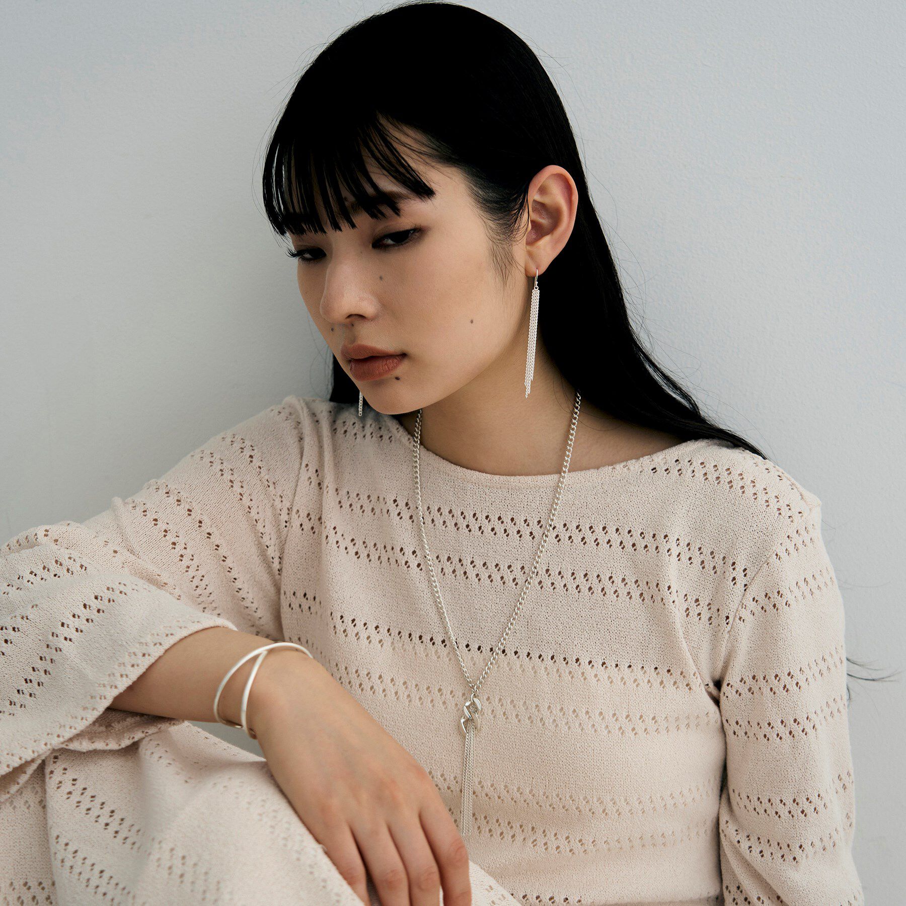 COCOSHNIK ONKITSCH「シルバー カーブチェーンフリンジピアス」|ピアス|