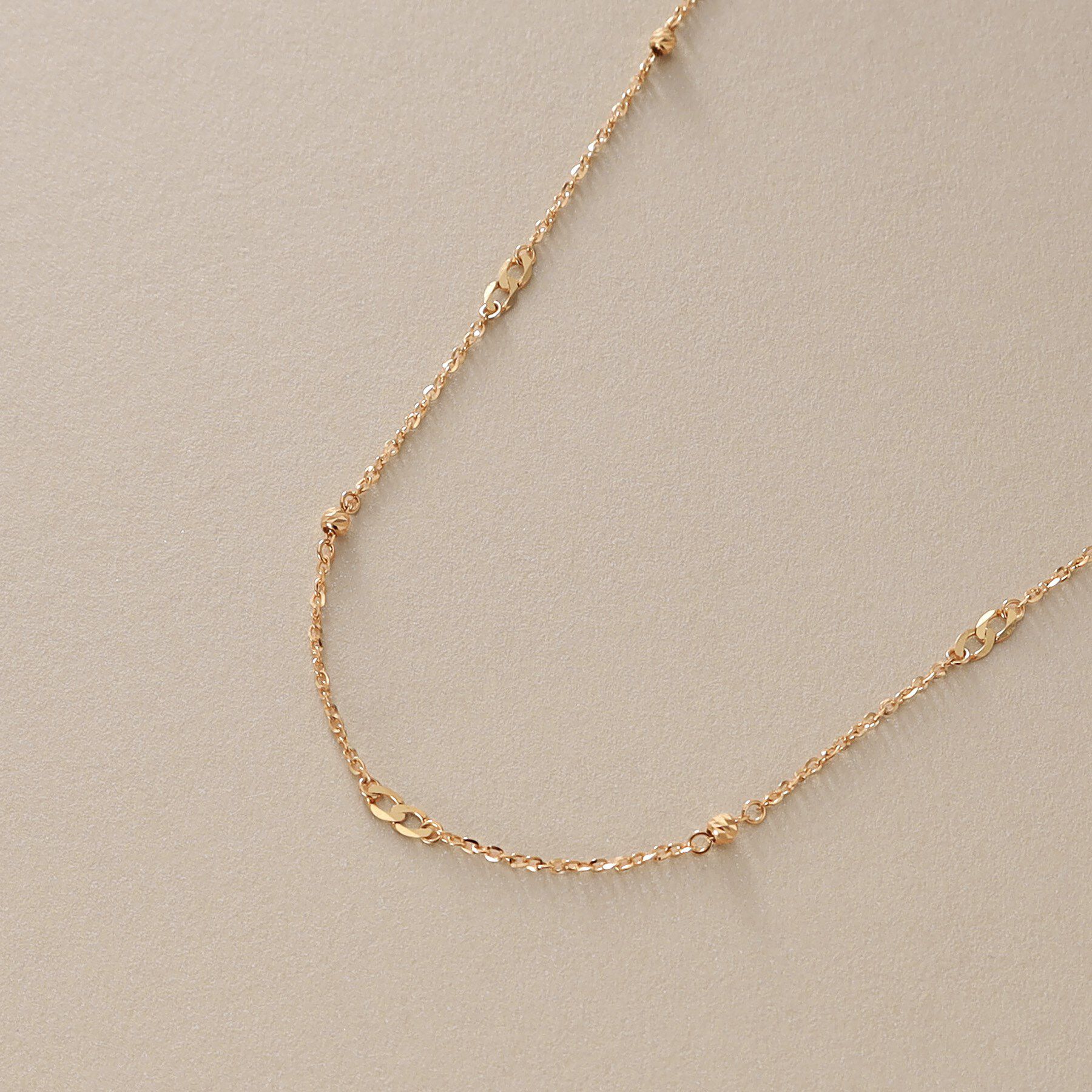 COCOSHNIK「K18フラットキヘイ&times;ハニーカットビーズ ネックレス」|ネックレス|