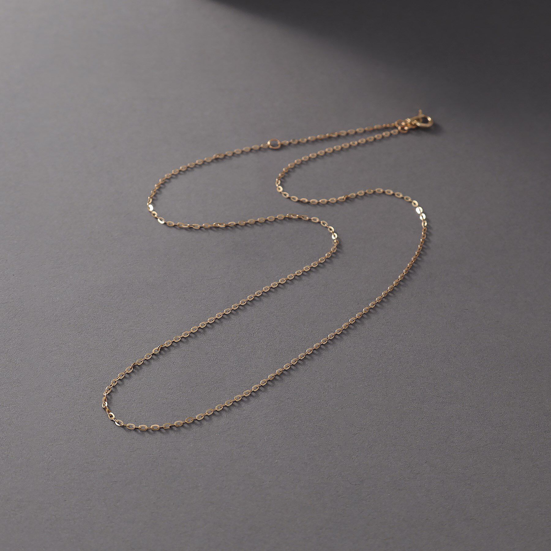 COCOSHNIK ONKITSCH「K10スキニーネックレス フラッシュケーブル」|ネックレス|イエローゴールド(1