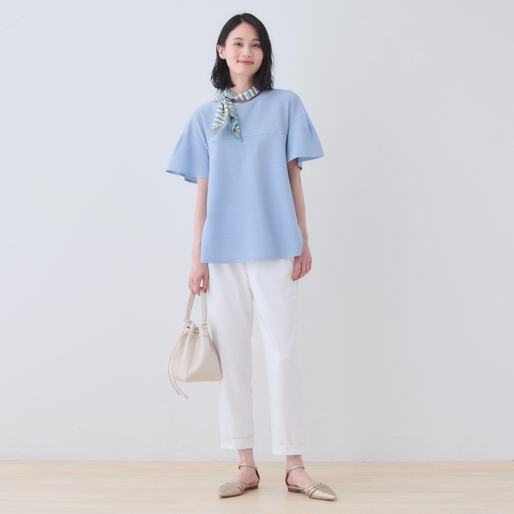 INDIVI「【洗える／体型カバー】凹凸素材フレアデザイントップス」|Tシャツ・カットソー|