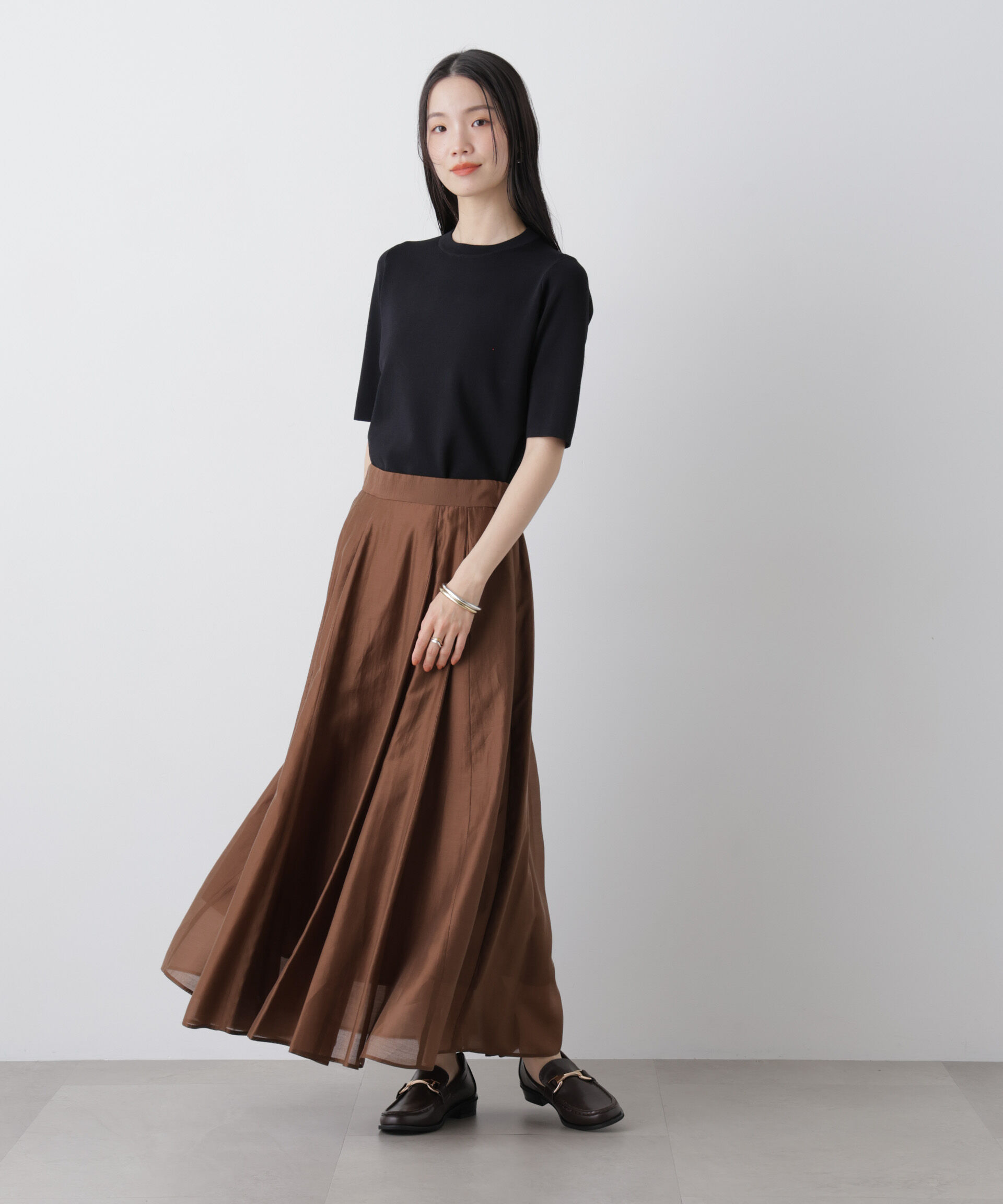 nano･universe「シアーオーガンジータックフレアスカート」|スカート|