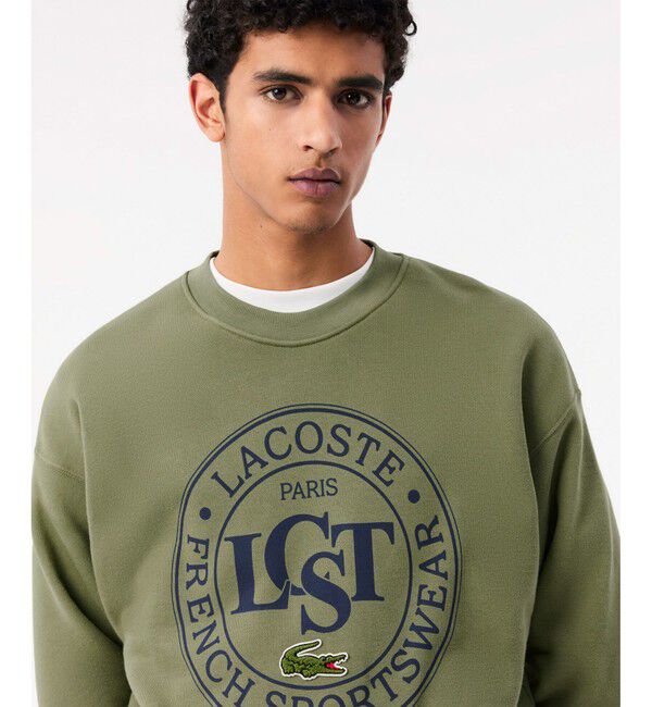 LACOSTE「オーバーサイズ LCSTサークルグラフィッククルーネックスウェット トレーナー」|スウェット・ジャージ|
