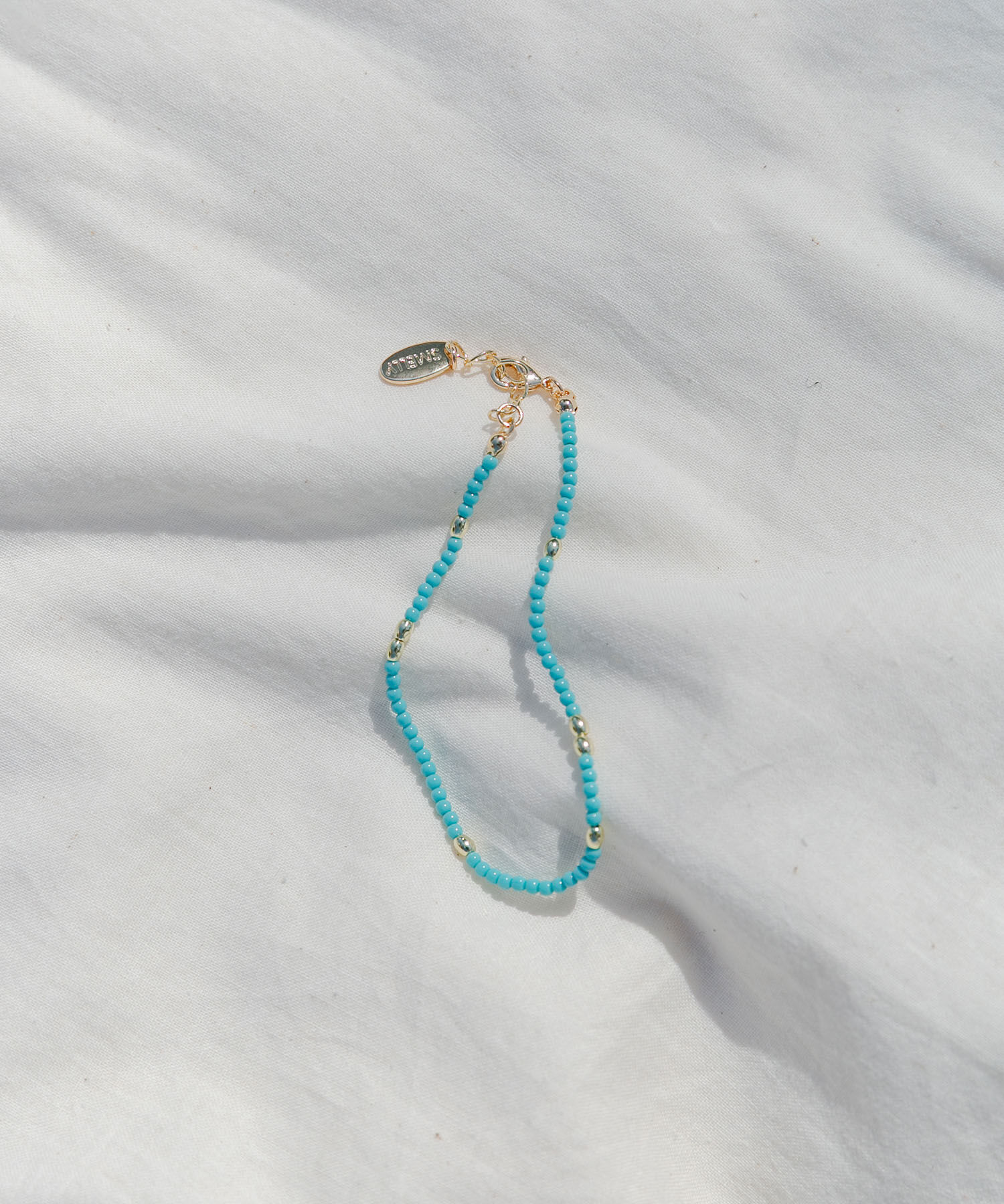 SMELLY「ターコイズカラービーズブレスレット」|ブレスレット・バングル|