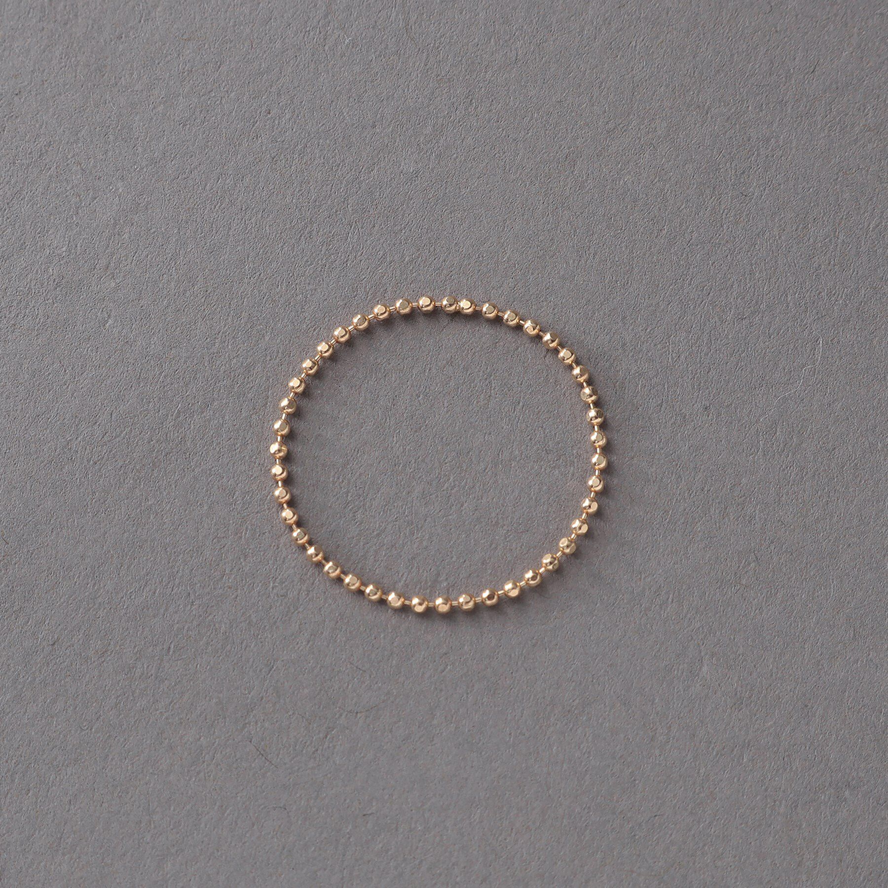 COCOSHNIK ONKITSCH「K10スキニーリング カットボール」|リング|