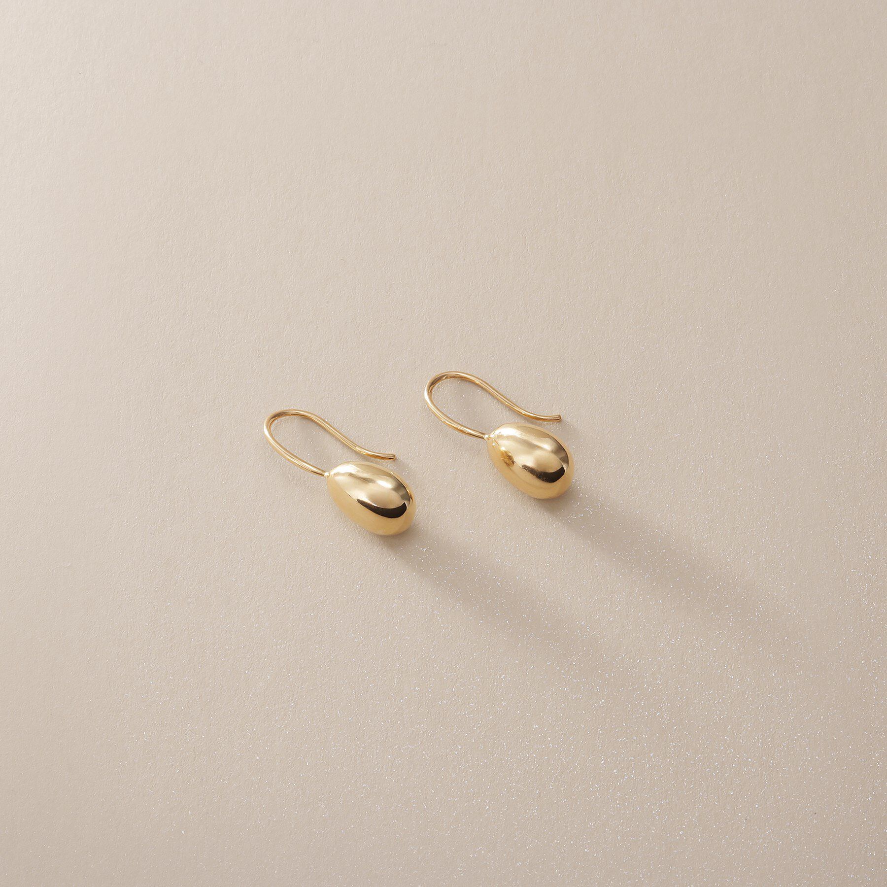 COCOSHNIK「K10中空エッグシェイプ フックピアス」|ピアス|