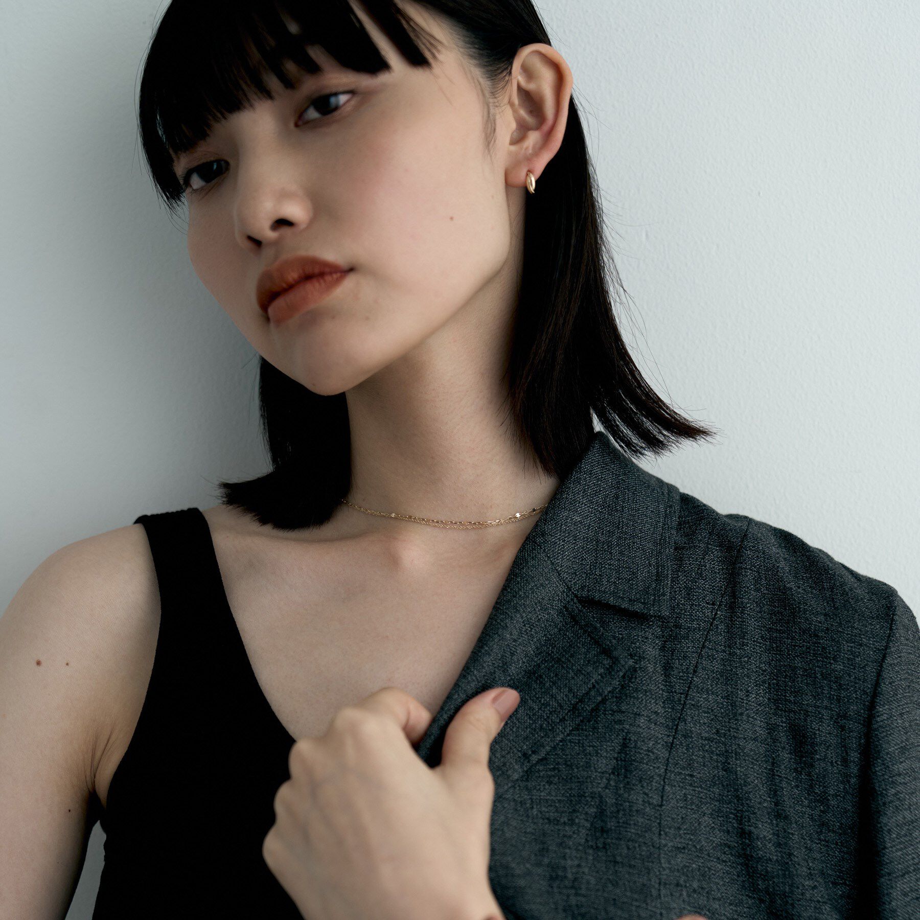 COCOSHNIK ONKITSCH「K10ドームクロスアーチピアス」|ピアス|