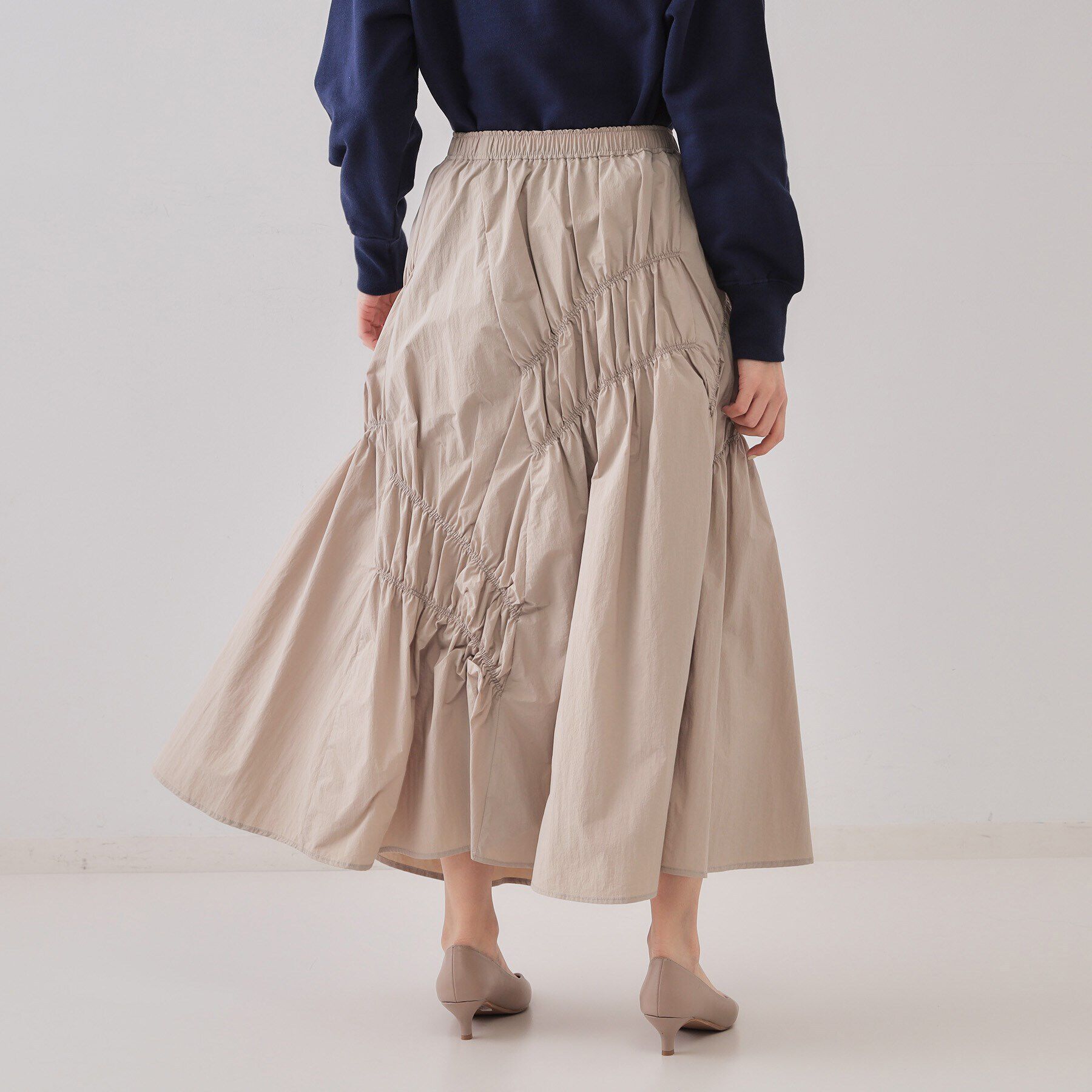 OPAQUE.CLIP「シャーリングアシメフレアスカート【洗濯機洗い可】」|スカート|