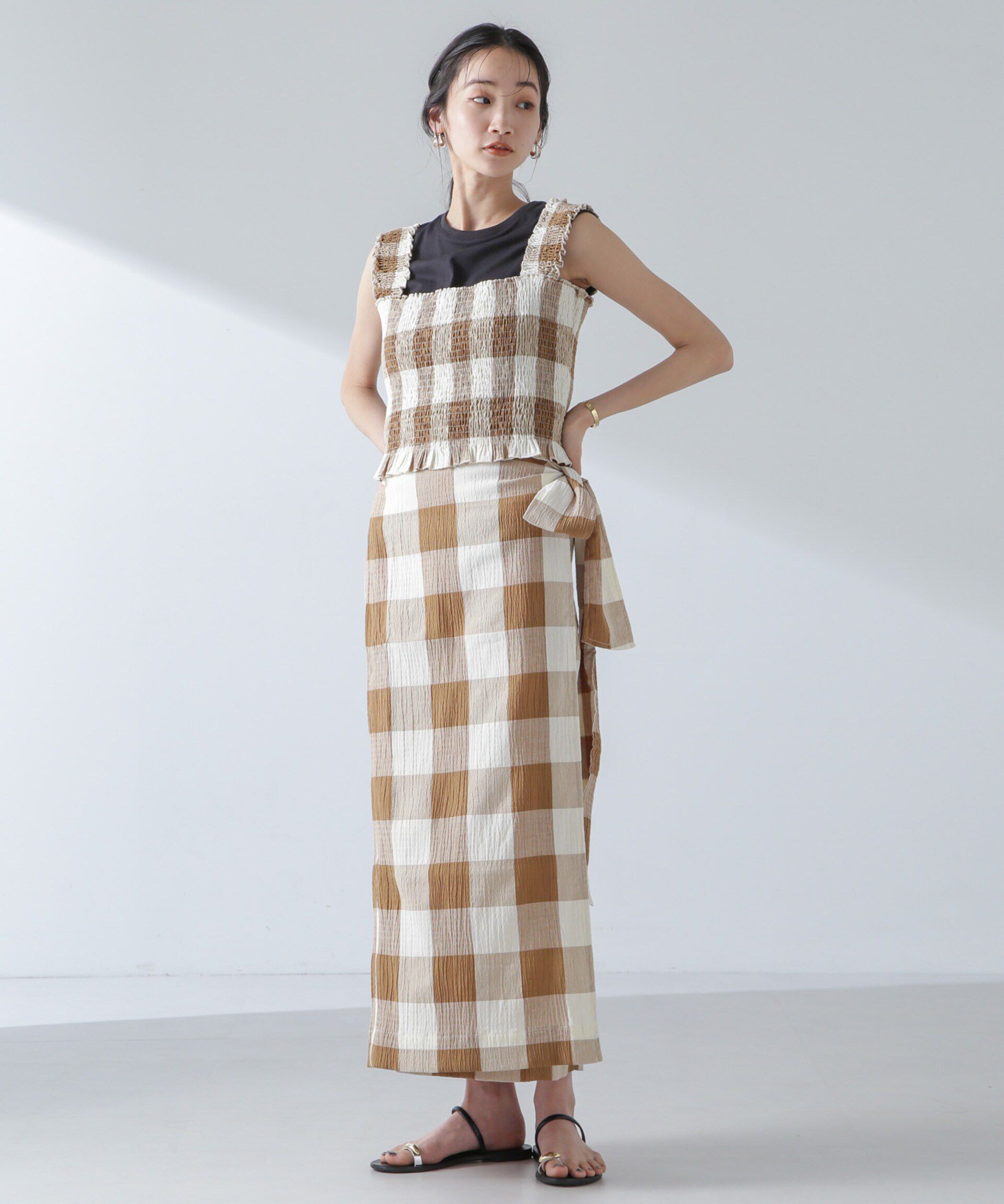 nano･universe「RITA ROW/Checkered smocked body top」|ダウンベスト・ベスト|