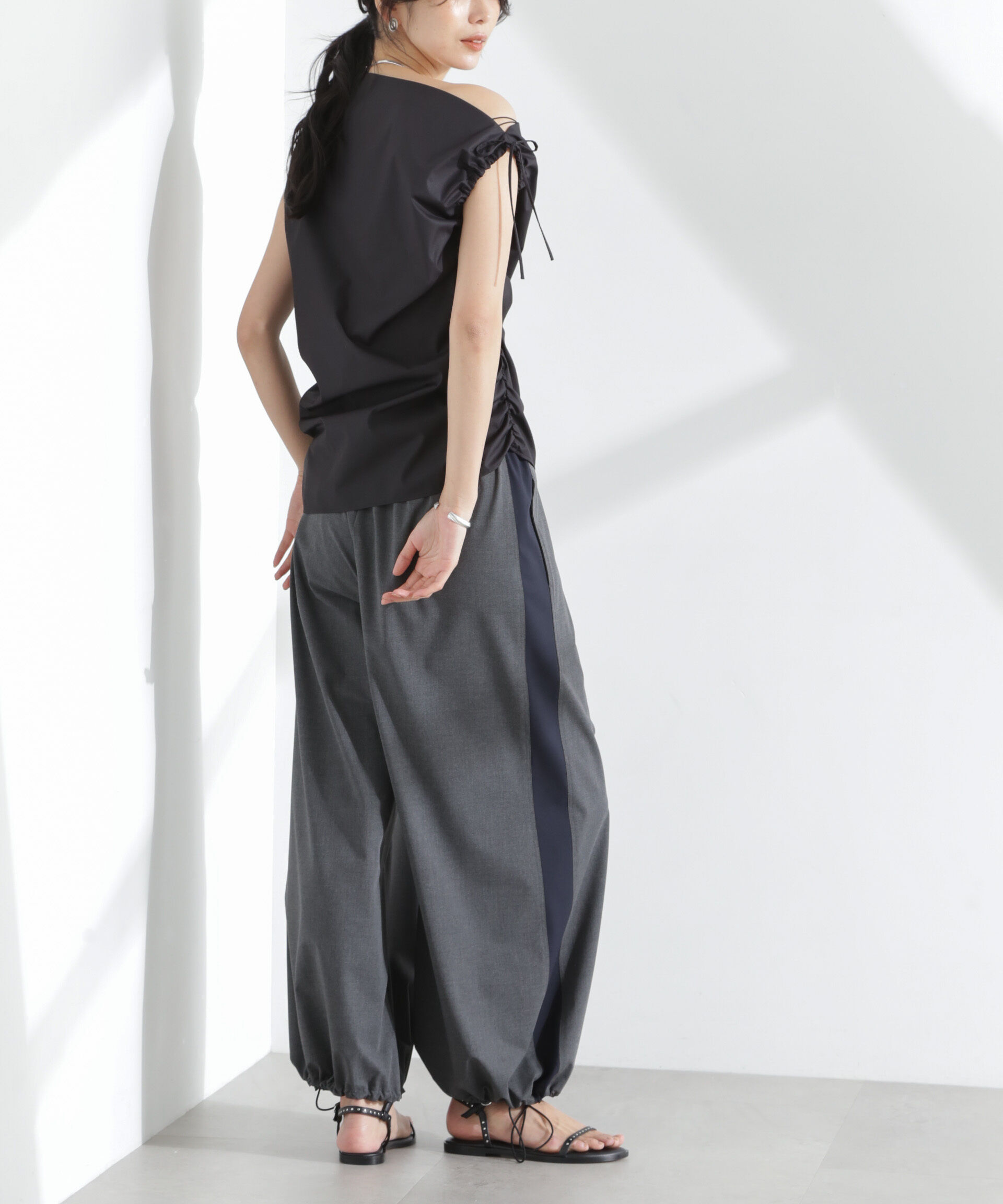 nano･universe「ラインイージーワイドパンツ」|チノ|