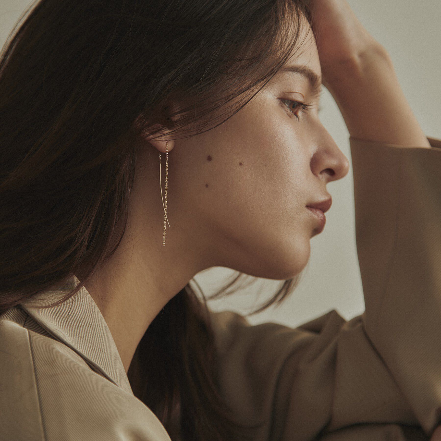 COCOSHNIK「K10クリスクロスチェーンフリンジ ピアス」|ピアス|