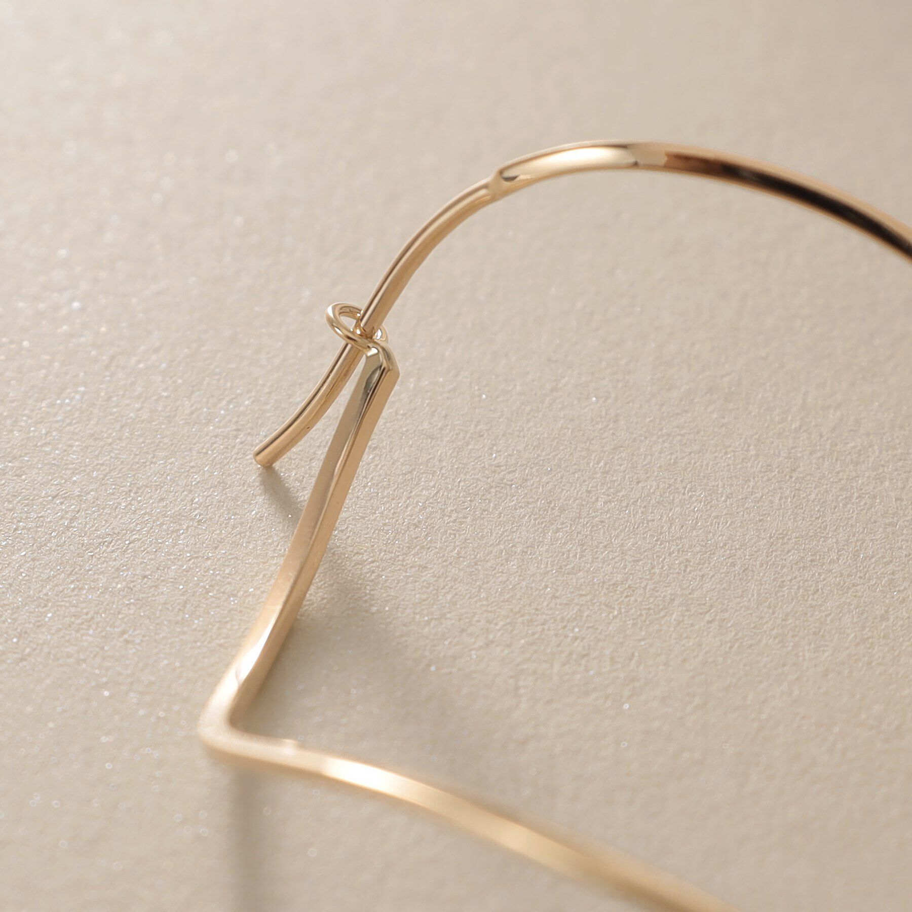 COCOSHNIK「K10ポリッシュ 変形フープピアスM」|ピアス|