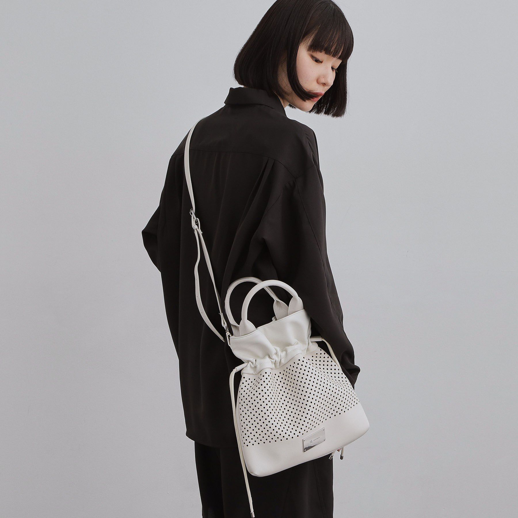 tk.TAKEO KIKUCHI「【2WAY】パンチングドロストバッグ」|ショルダー・メッセンジャー|