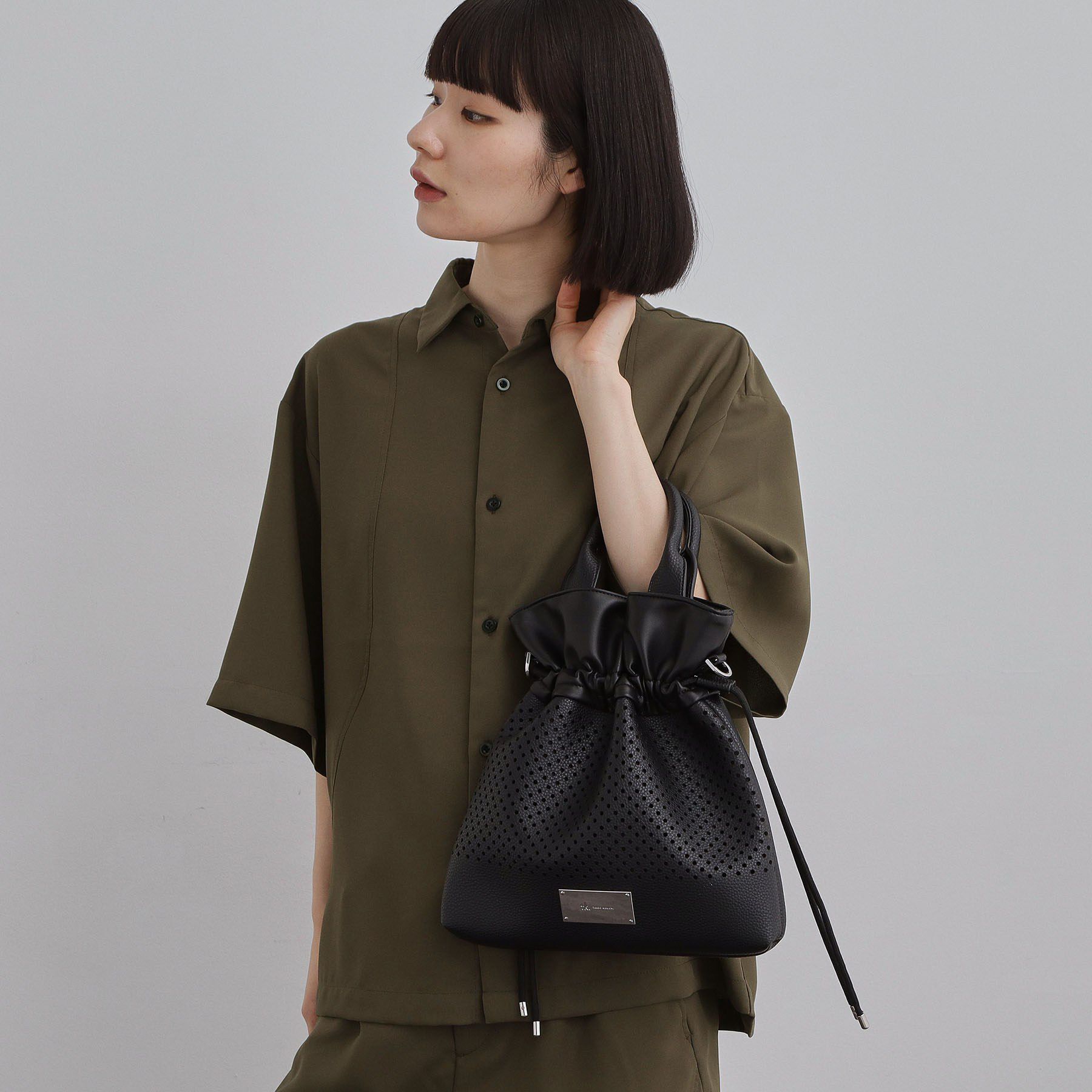 tk.TAKEO KIKUCHI「【2WAY】パンチングドロストバッグ」|ショルダー・メッセンジャー|