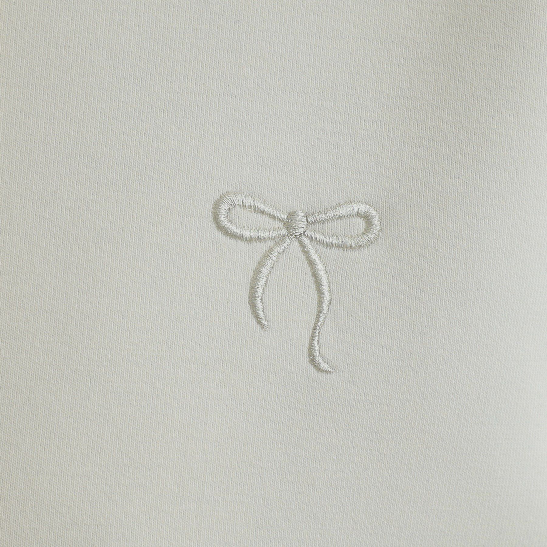 Couture broach「【マシンウォッシャブル・UVケア・大人可愛い】リボン刺繍ダンボールZIPフーディ」|パーカー|