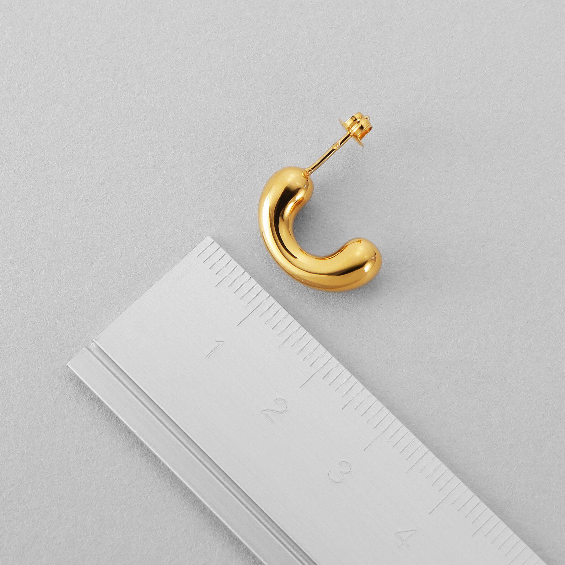 COCOSHNIK ONKITSCH「シルバー ニュアンスアークピアス GP」|ピアス|