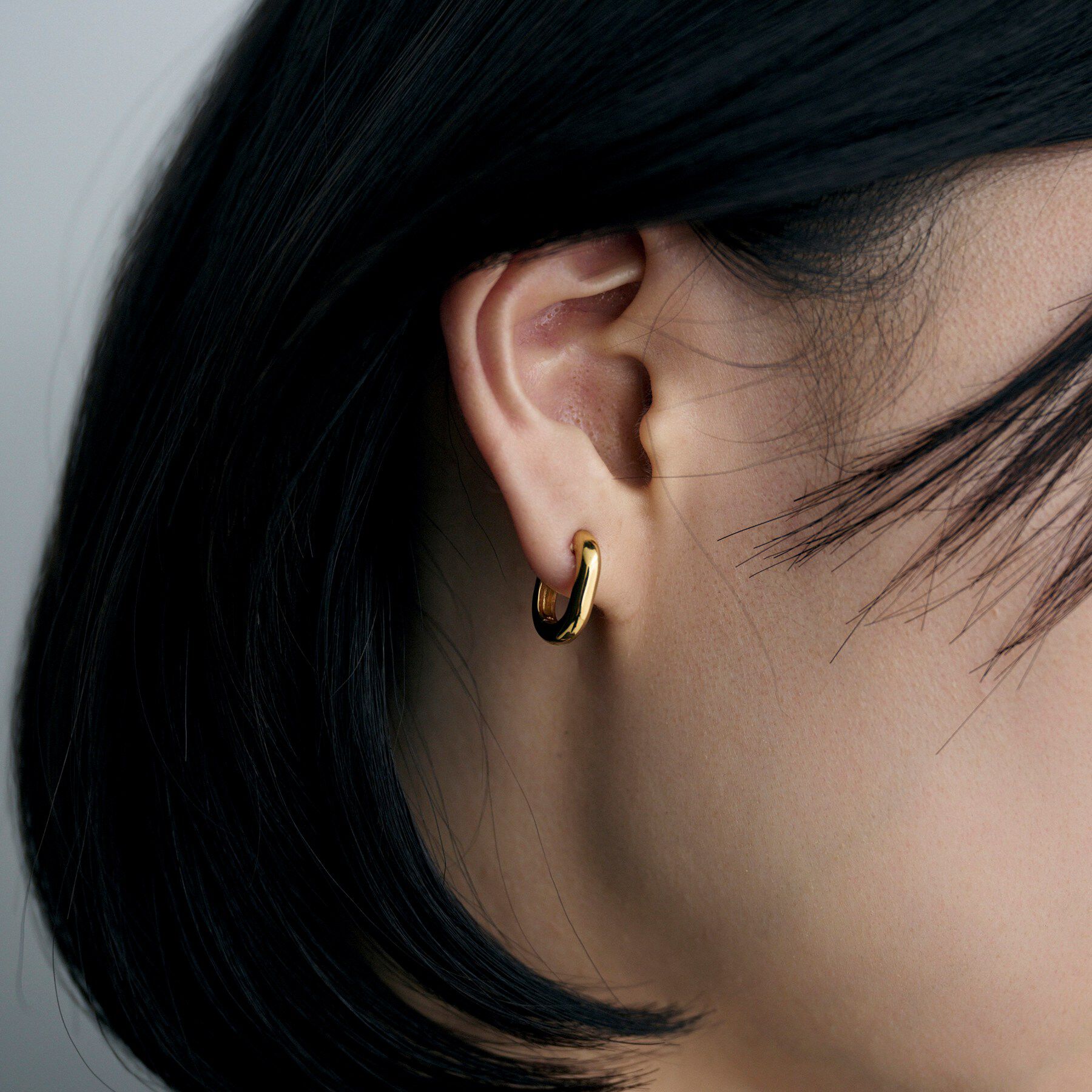 COCOSHNIK ONKITSCH「シルバー ハギーイヤリング トラック GP」|イヤリング|