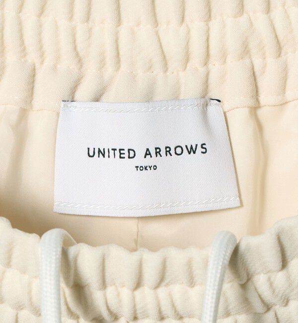 UNITED ARROWS「COMFY クロップド ワイドパンツ ホワイト ‐防汚 UVカット ウォッシャブル‐」|チノ|