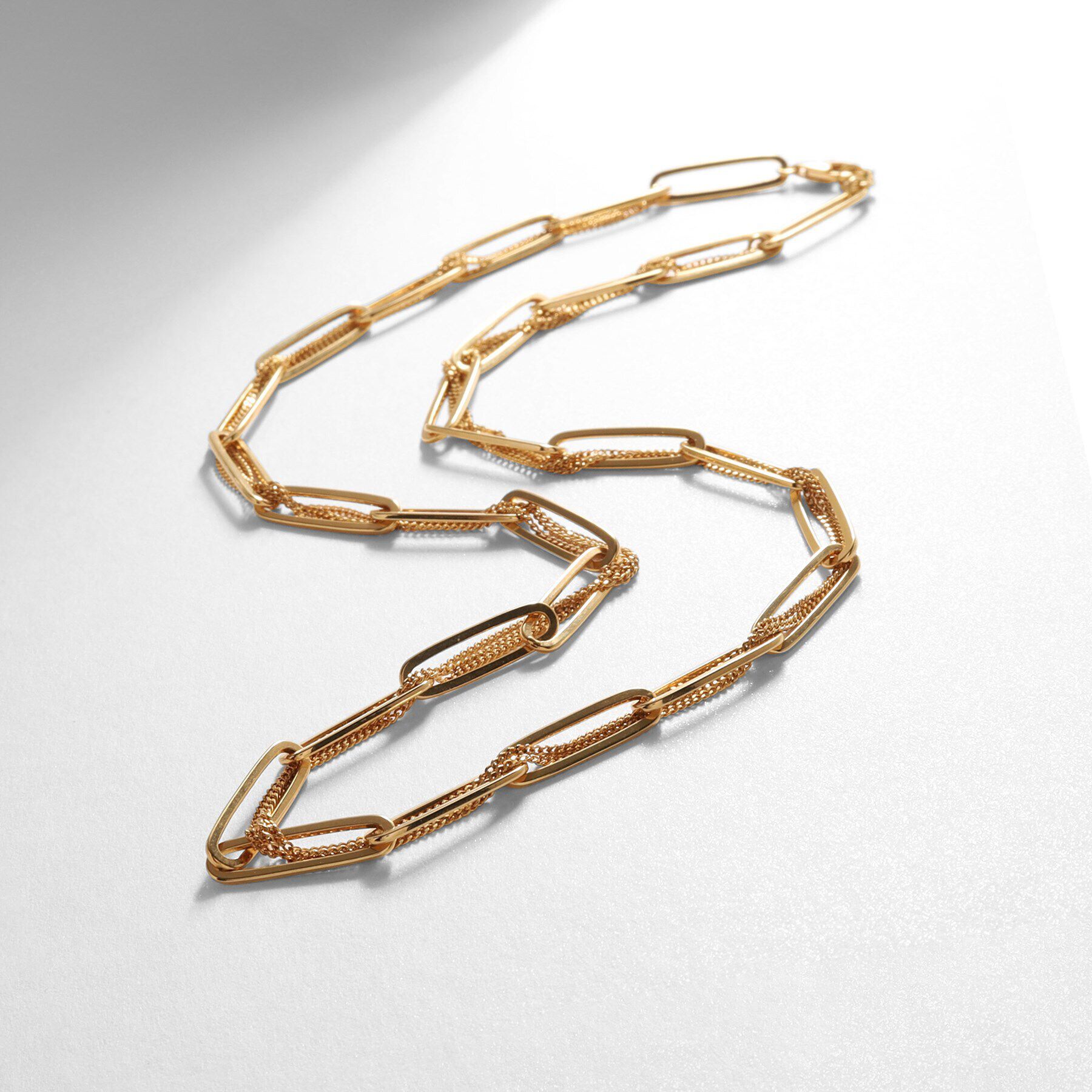 COCOSHNIK ONKITSCH「シルバー ミックスチェーン フラットカーブ スルー ネックレス GP」|ネックレス|ゴールド(600)