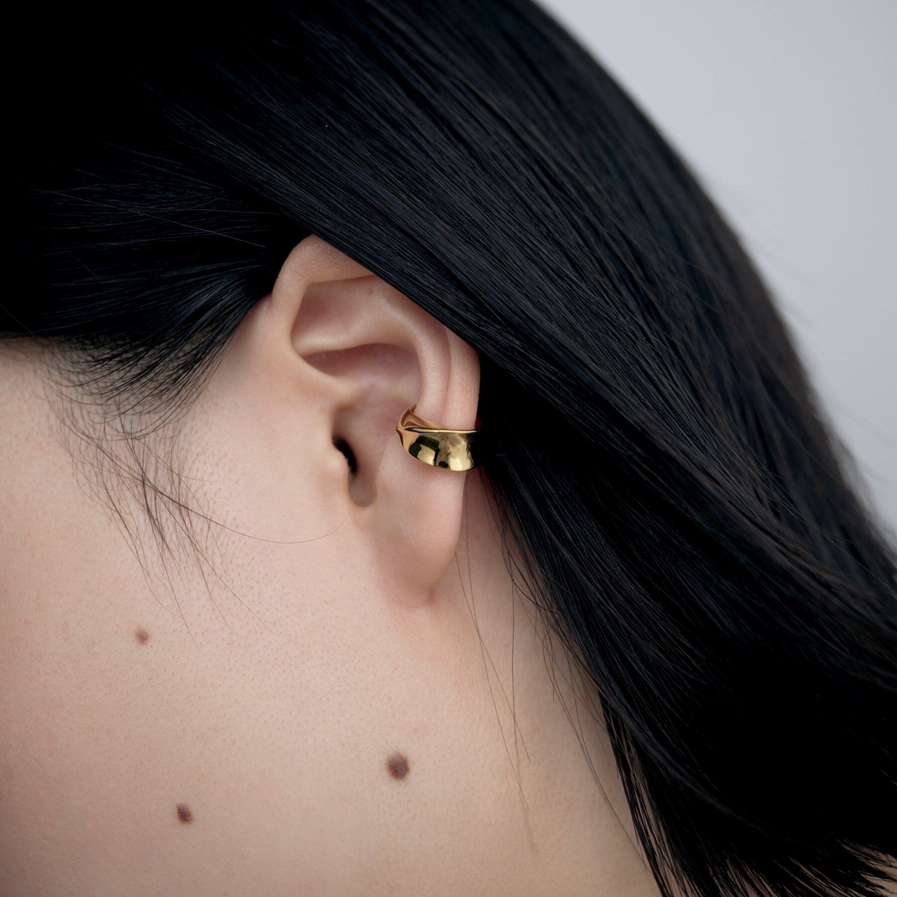 COCOSHNIK ONKITSCH「シルバー フローツイストイヤカフ GP」|イヤーカフ|