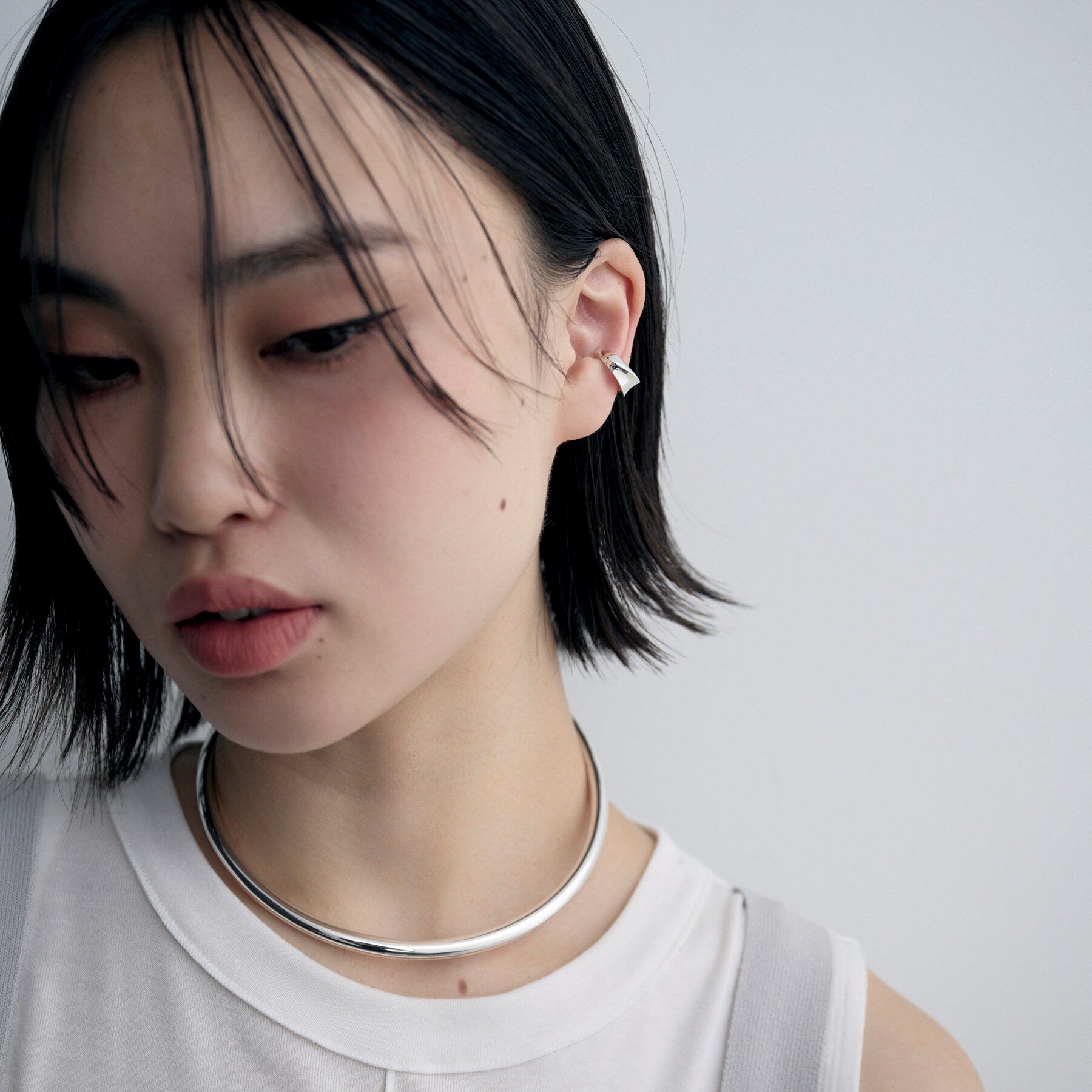 COCOSHNIK ONKITSCH「シルバー フローツイストイヤカフ」|イヤーカフ|