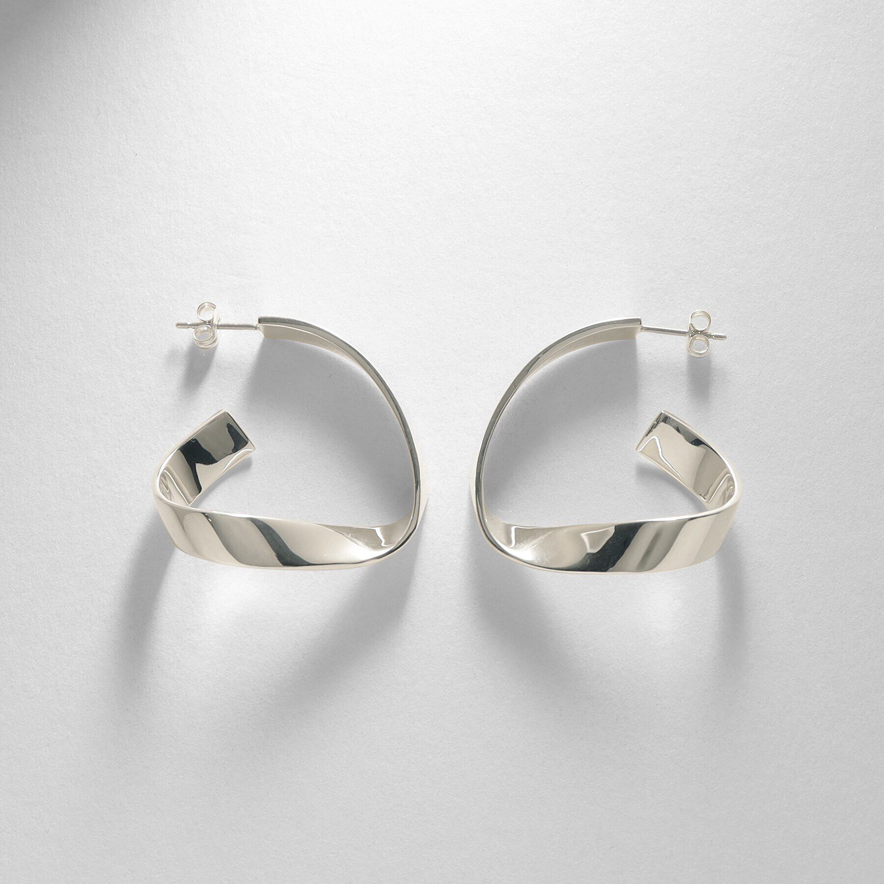 COCOSHNIK ONKITSCH「シルバー フォールディングピアス ストリーム」|ピアス|