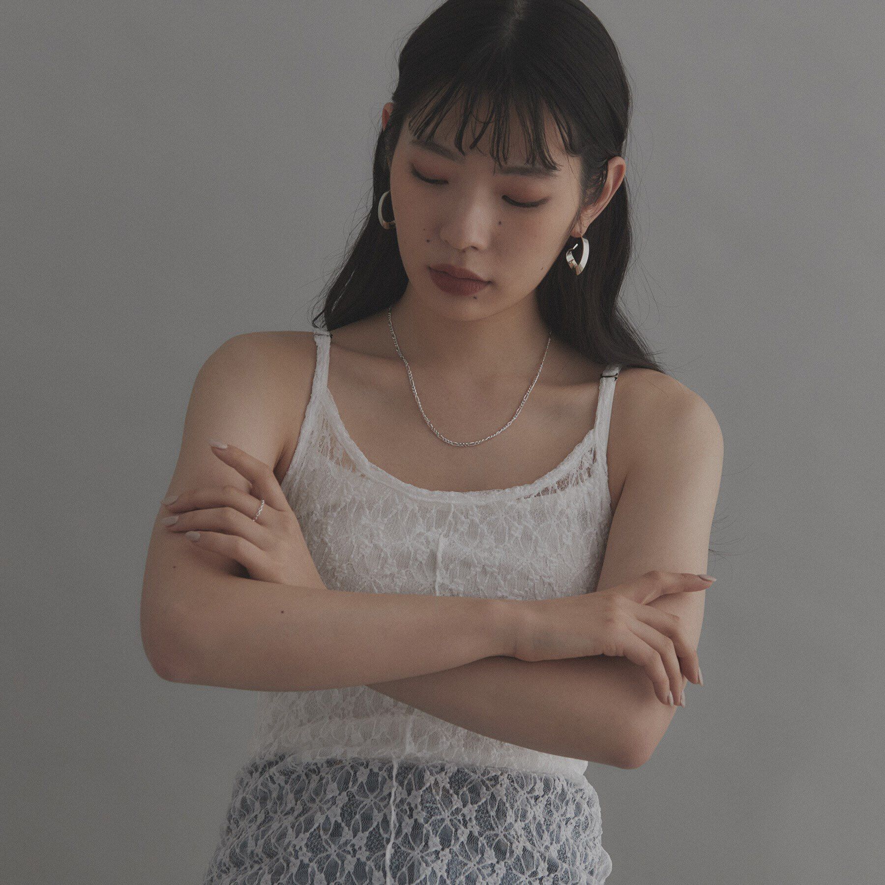 COCOSHNIK ONKITSCH「シルバー フォールディングピアス ストリーム」|ピアス|