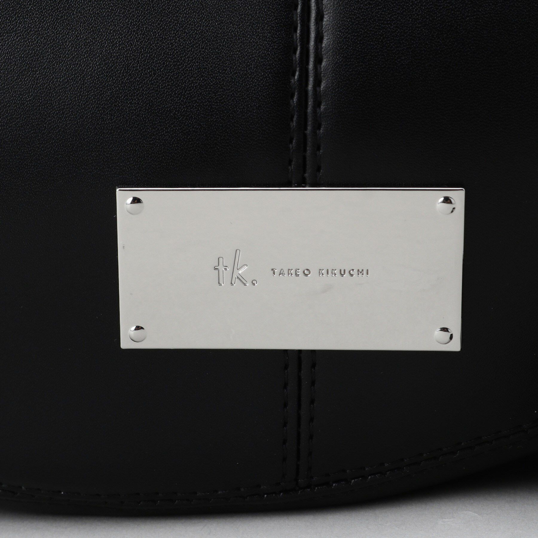 tk.TAKEO KIKUCHI「アシンメトリーハーフムーンショルダーバッグ」|ショルダー・メッセンジャー|