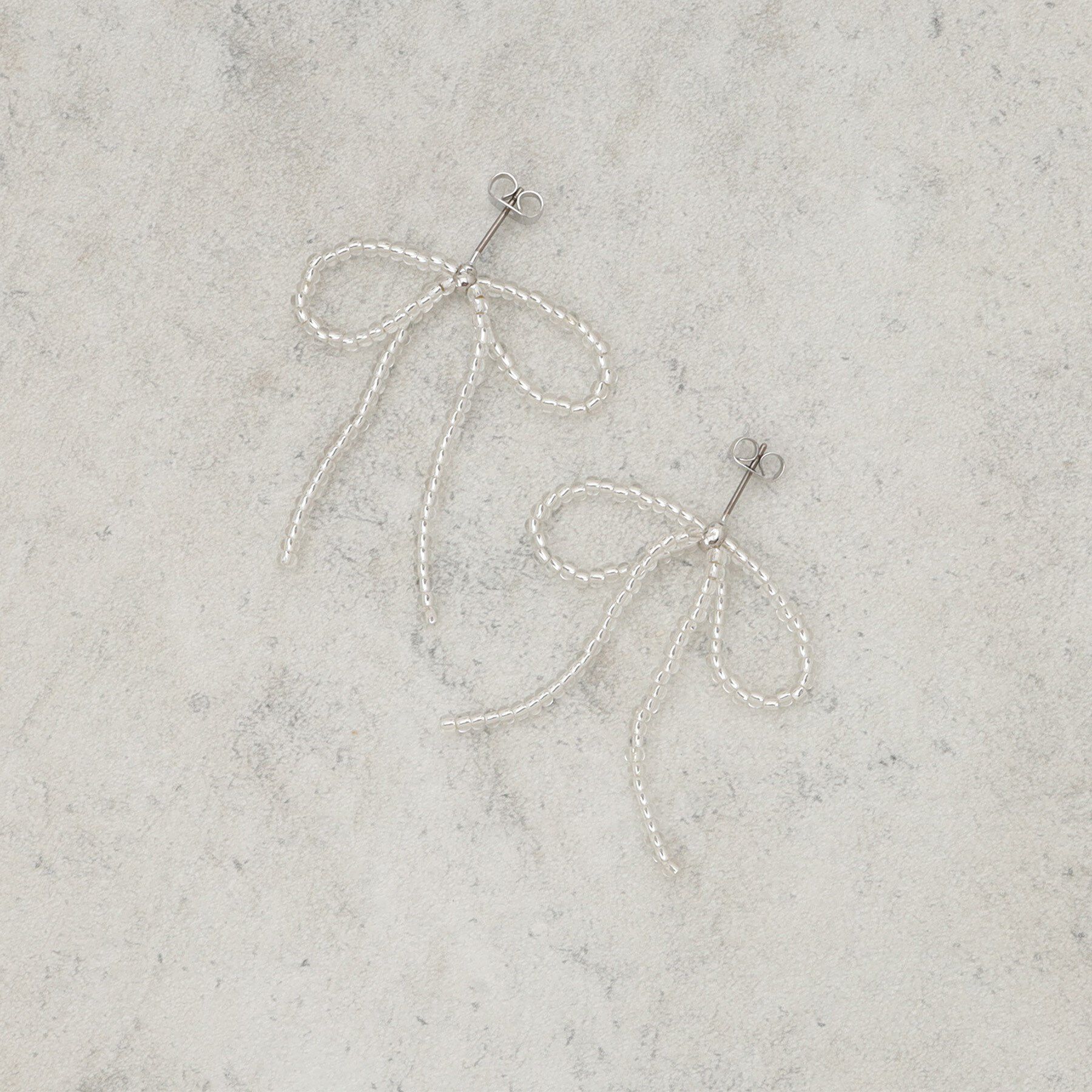 OPAQUE.CLIP「ビーズリボンピアス」|ピアス|