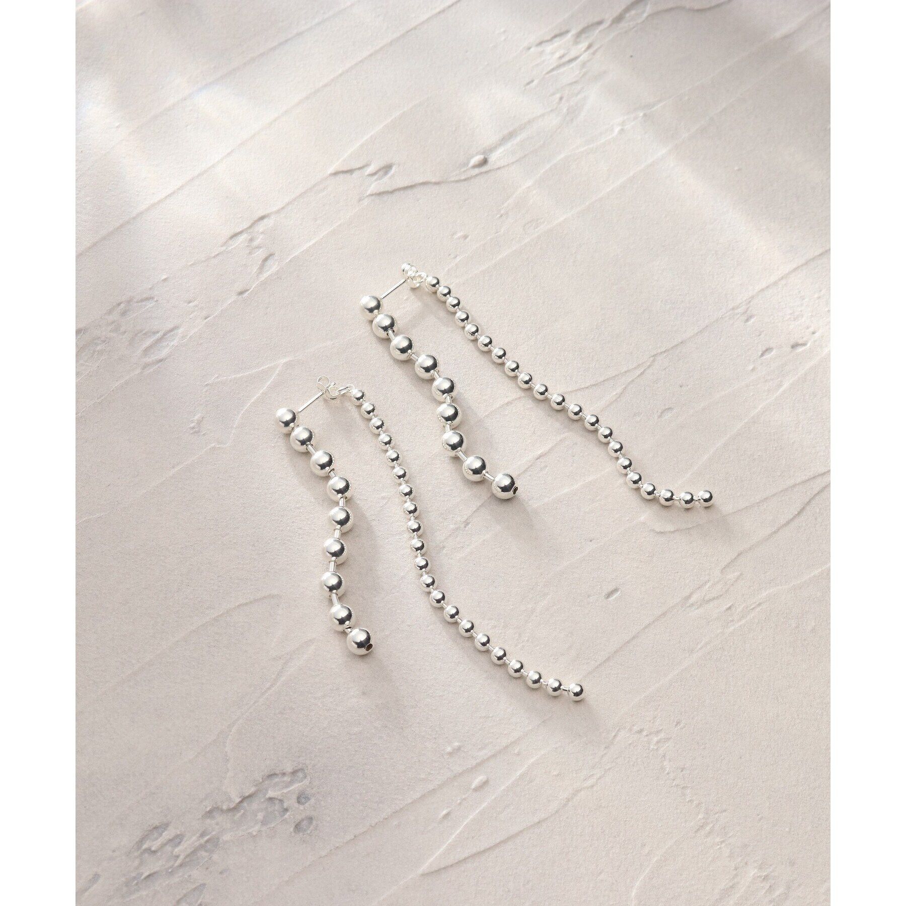 COCOSHNIK ONKITSCH「シルバー チェーンピアス ボール フロントバック」|ピアス|