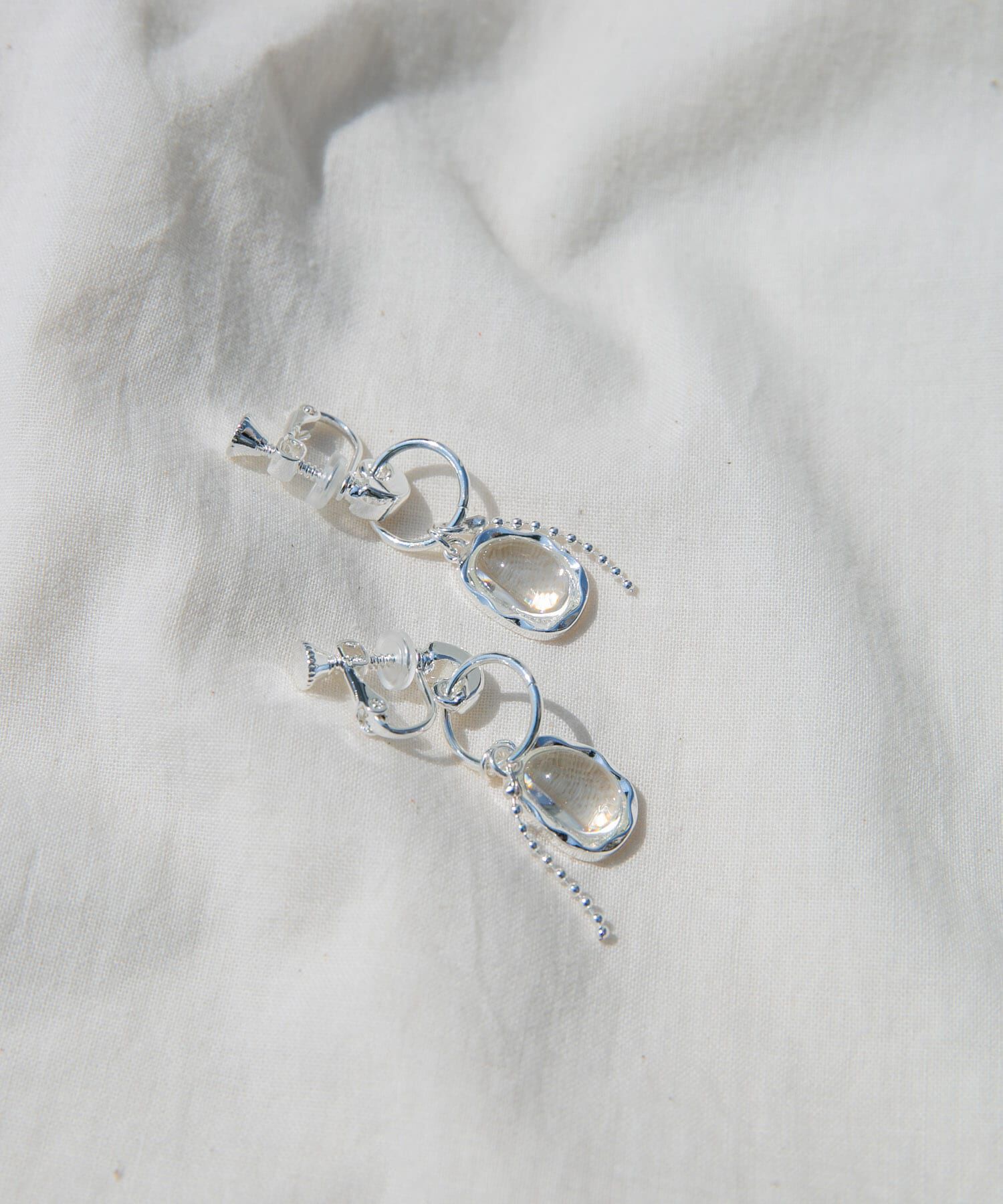 SMELLY「クリアドロップチェーンイヤリング」|イヤリング|