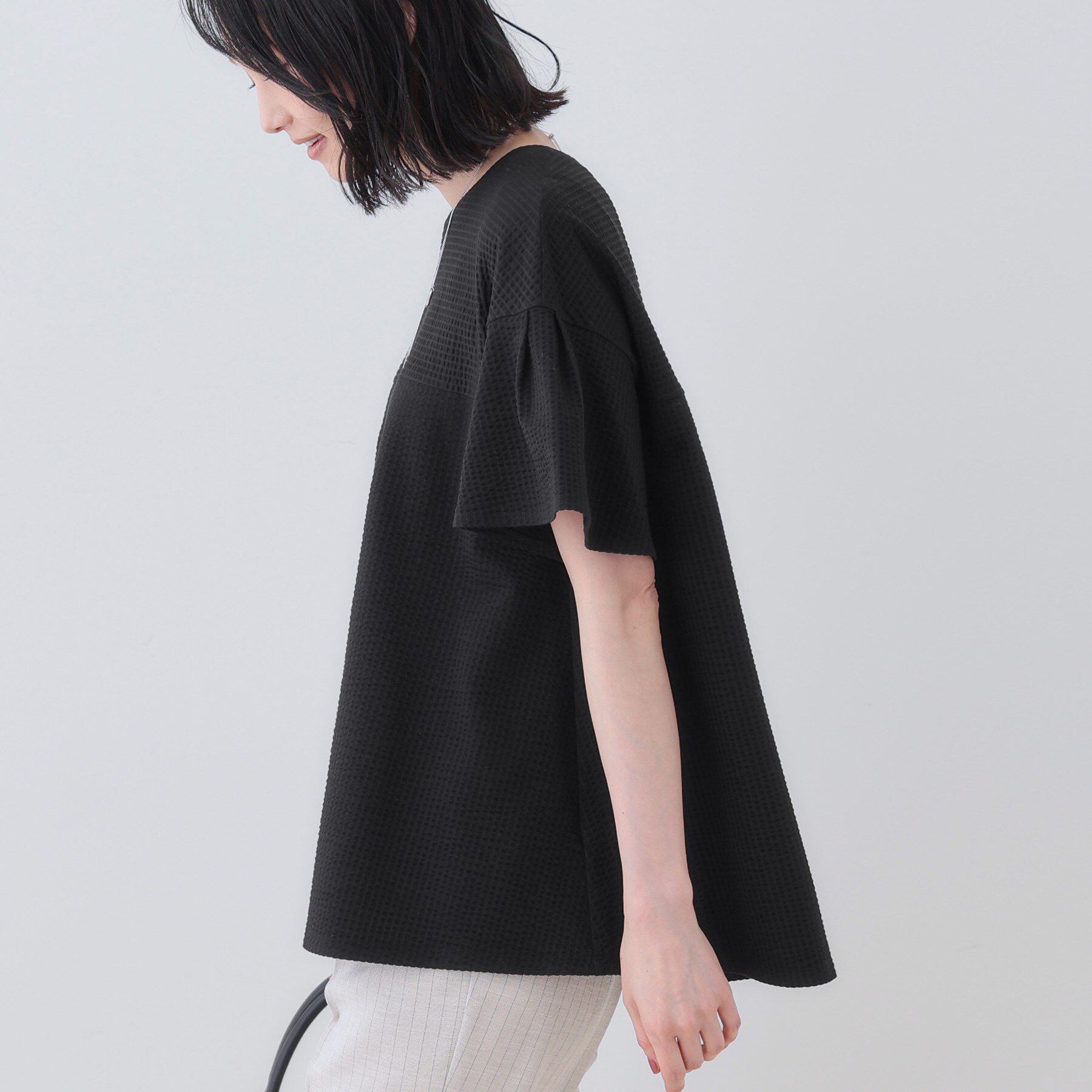 INDIVI「【洗える／体型カバー】凹凸素材フレアデザイントップス」|Tシャツ・カットソー|