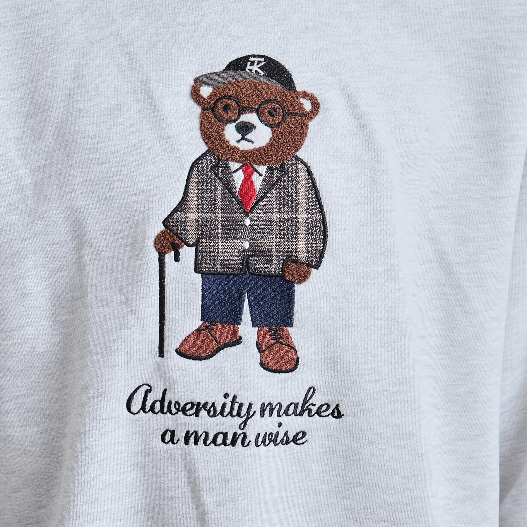 tk.TAKEO KIKUCHI「クマサガラスウェット」|パーカー|