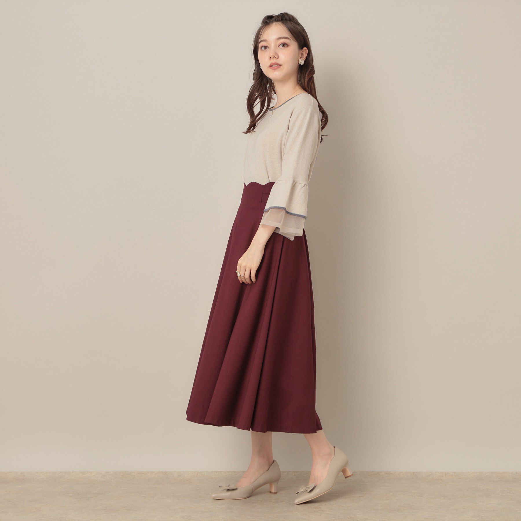 Couture broach「【フェミニン・着映え・通勤】シアーフレアー袖ニットトップス」|ニット・セーター|