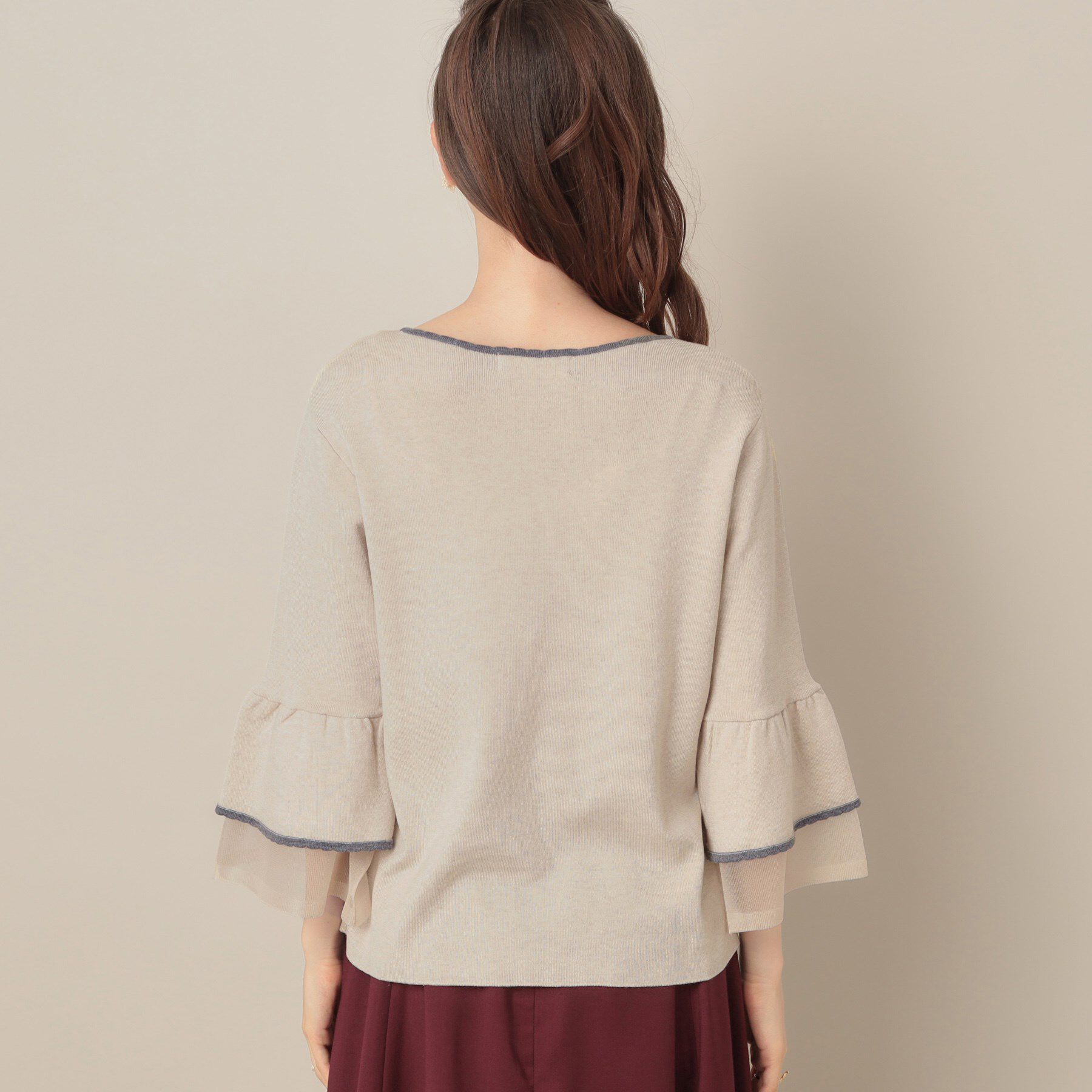 Couture broach「【フェミニン・着映え・通勤】シアーフレアー袖ニットトップス」|ニット・セーター|