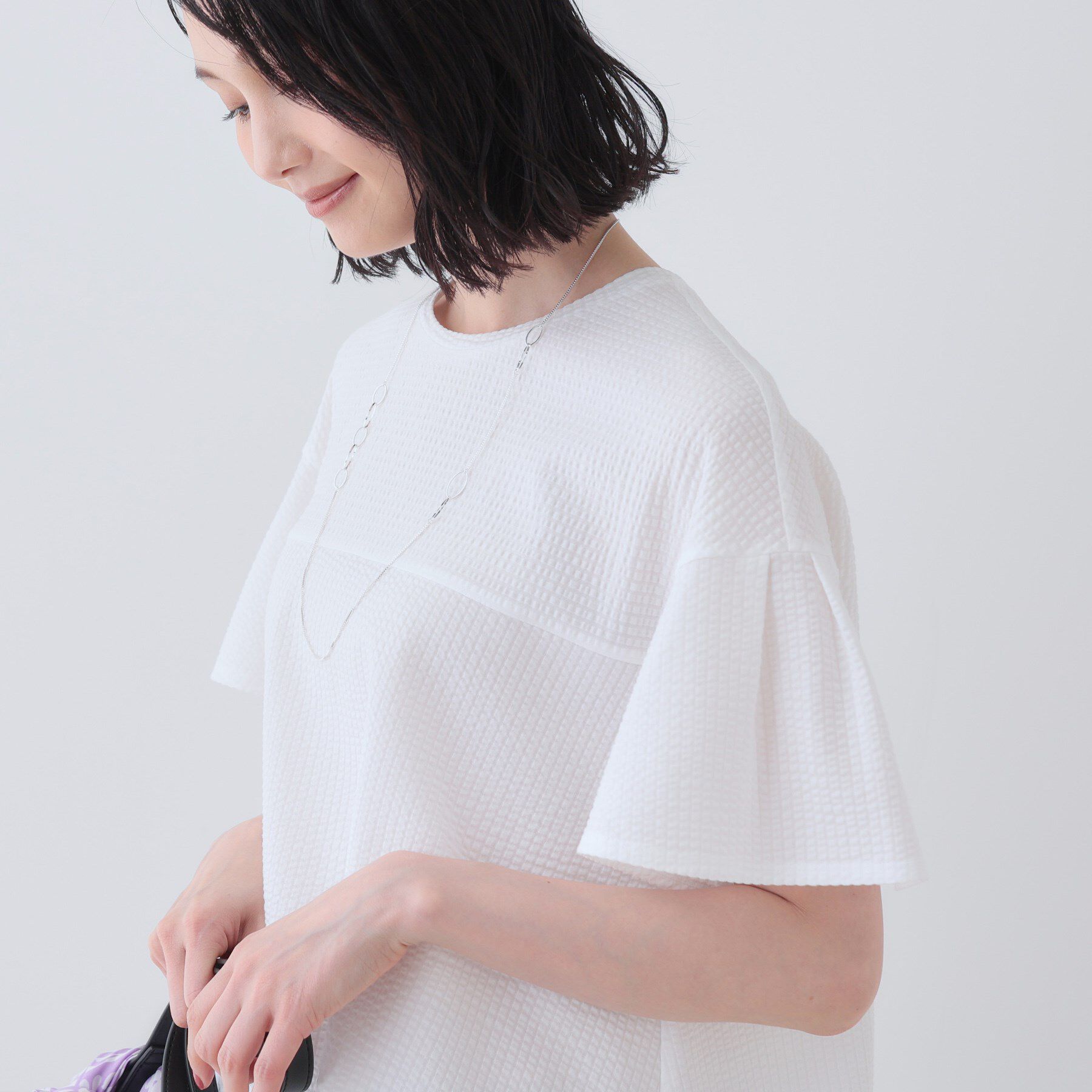 INDIVI「【洗える／体型カバー】凹凸素材フレアデザイントップス」|Tシャツ・カットソー|