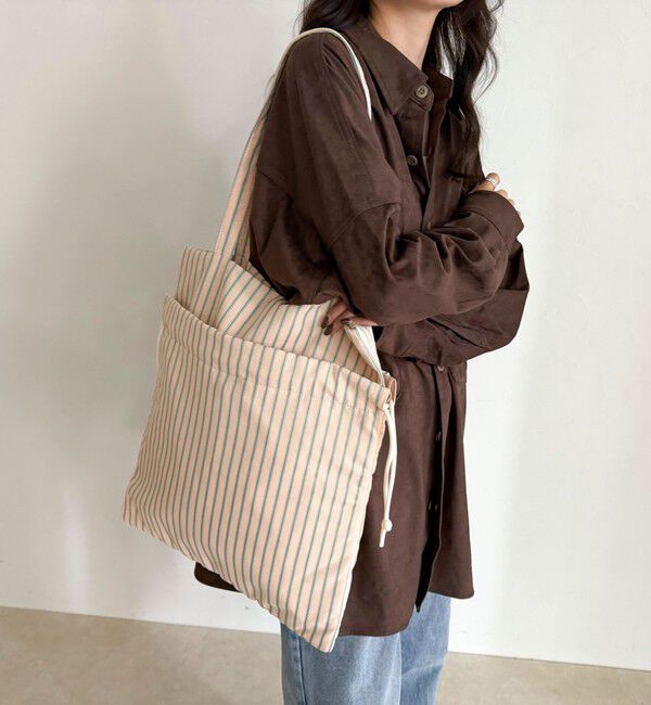 fredy emue「サッカーアウトポケットトートバッグ」|トートバッグ|オレンジ系その他