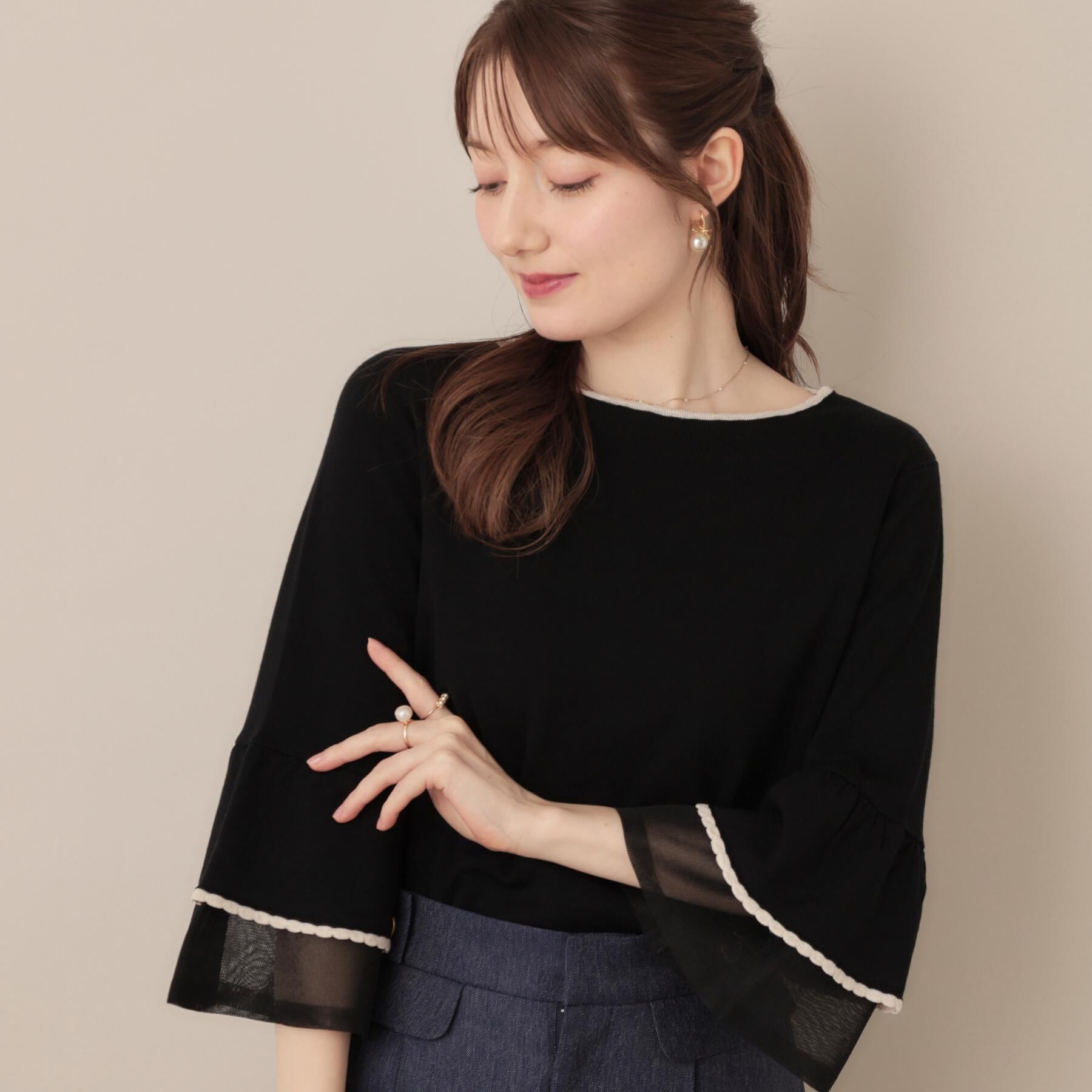 Couture broach「【フェミニン・着映え・通勤】シアーフレアー袖ニットトップス」|ニット・セーター|
