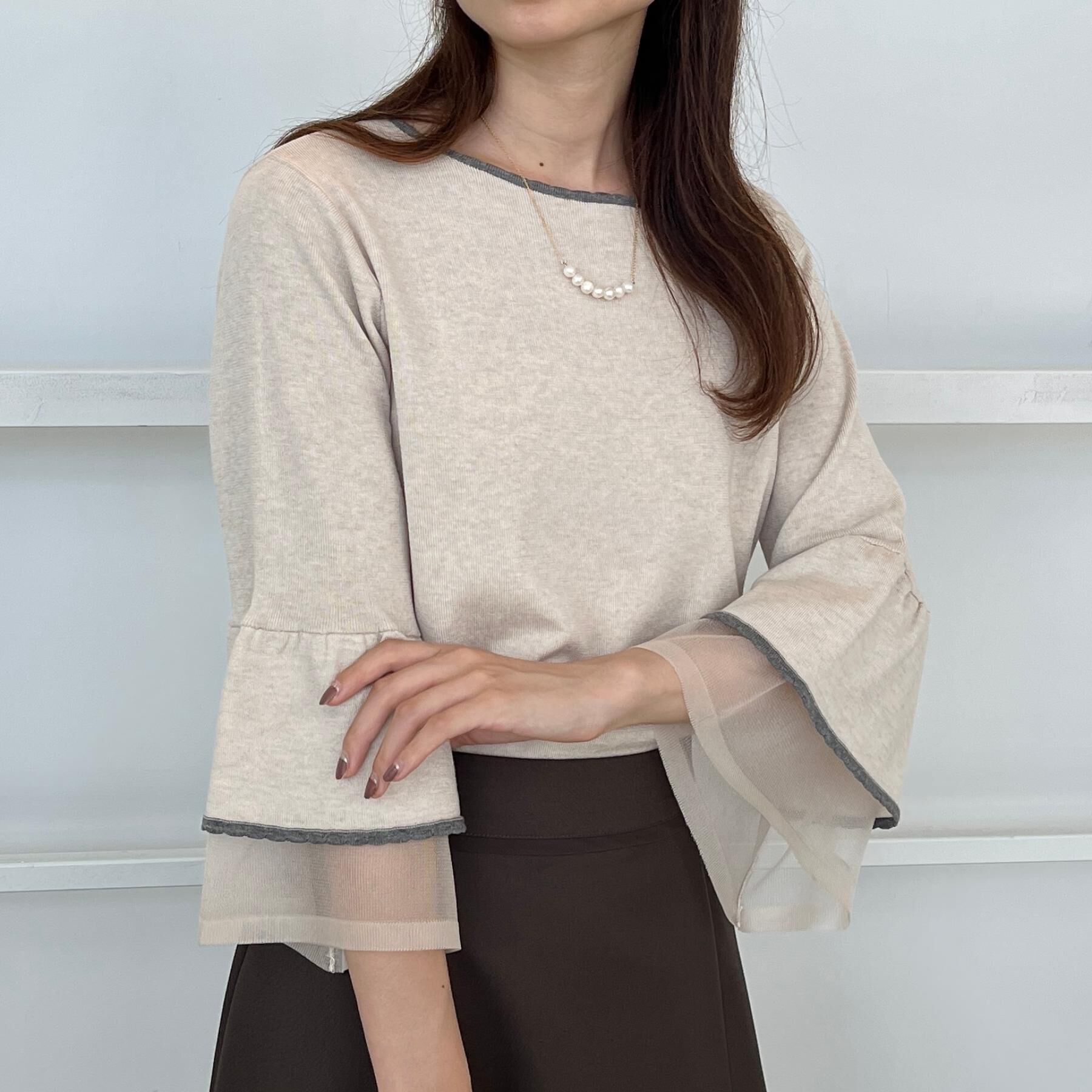 Couture broach「【フェミニン・着映え・通勤】シアーフレアー袖ニットトップス」|ニット・セーター|