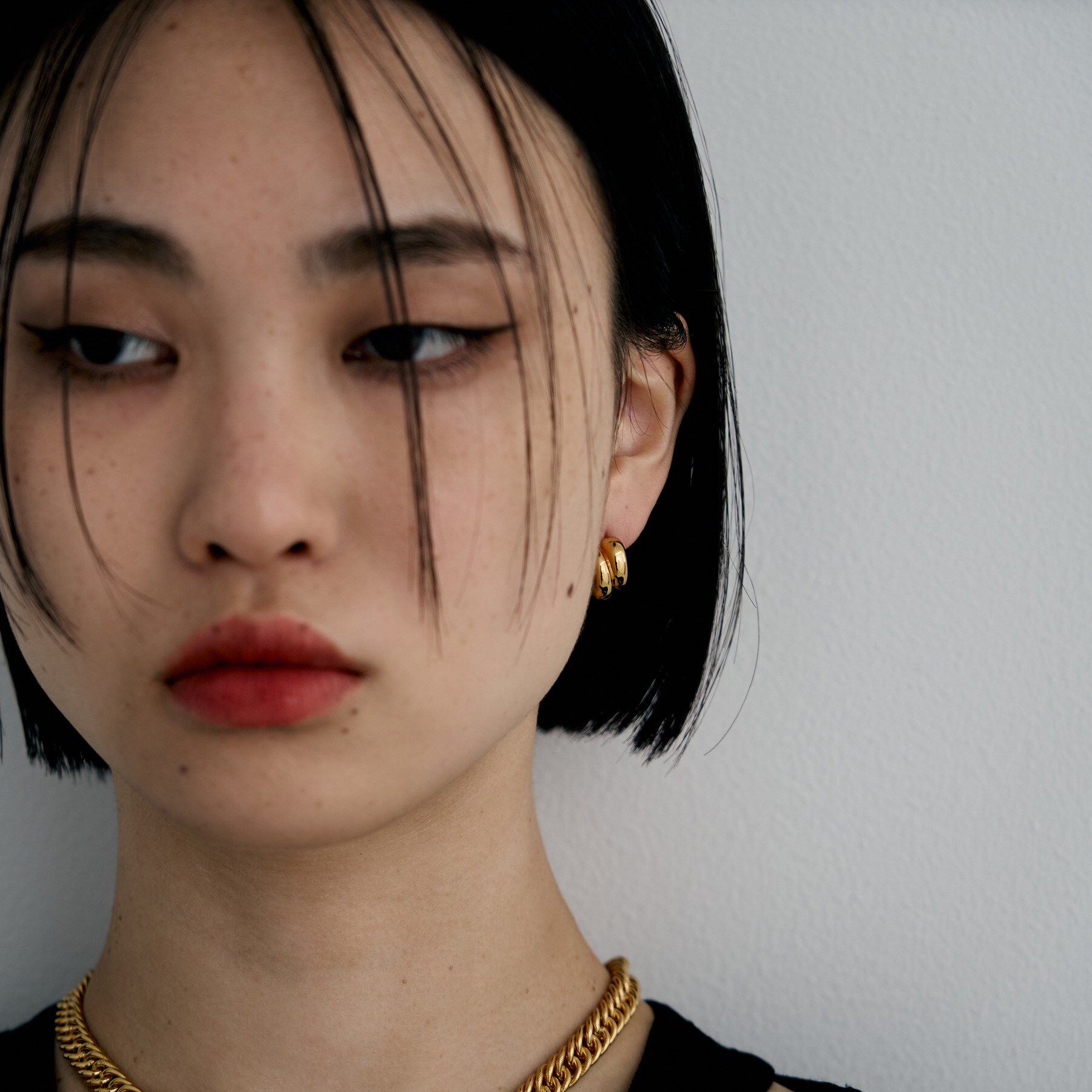 COCOSHNIK ONKITSCH「シルバー スモールフープ チャビーローテイテッドピアス GP」|ピアス|