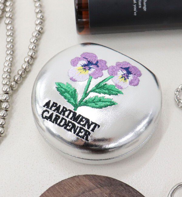 fredy emue「【JOli JOli/ジョリジョリ】刺しゅうラウンドケース」|ポーチ|シルバー