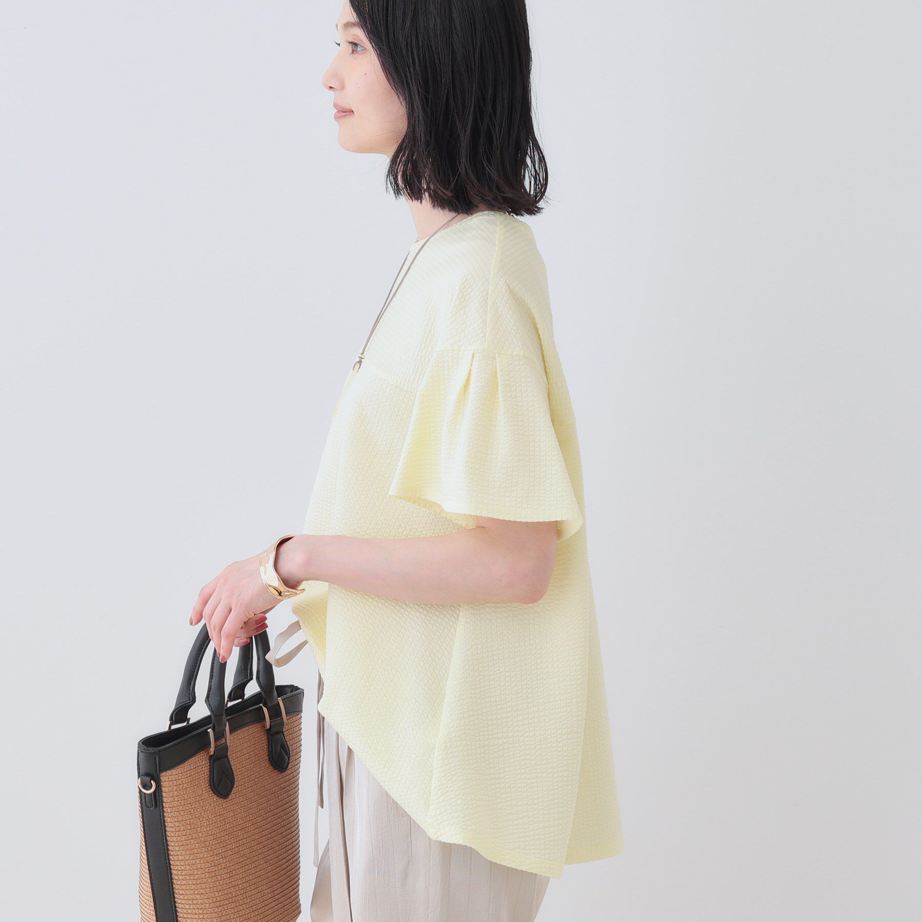 INDIVI「【洗える／体型カバー】凹凸素材フレアデザイントップス」|Tシャツ・カットソー|