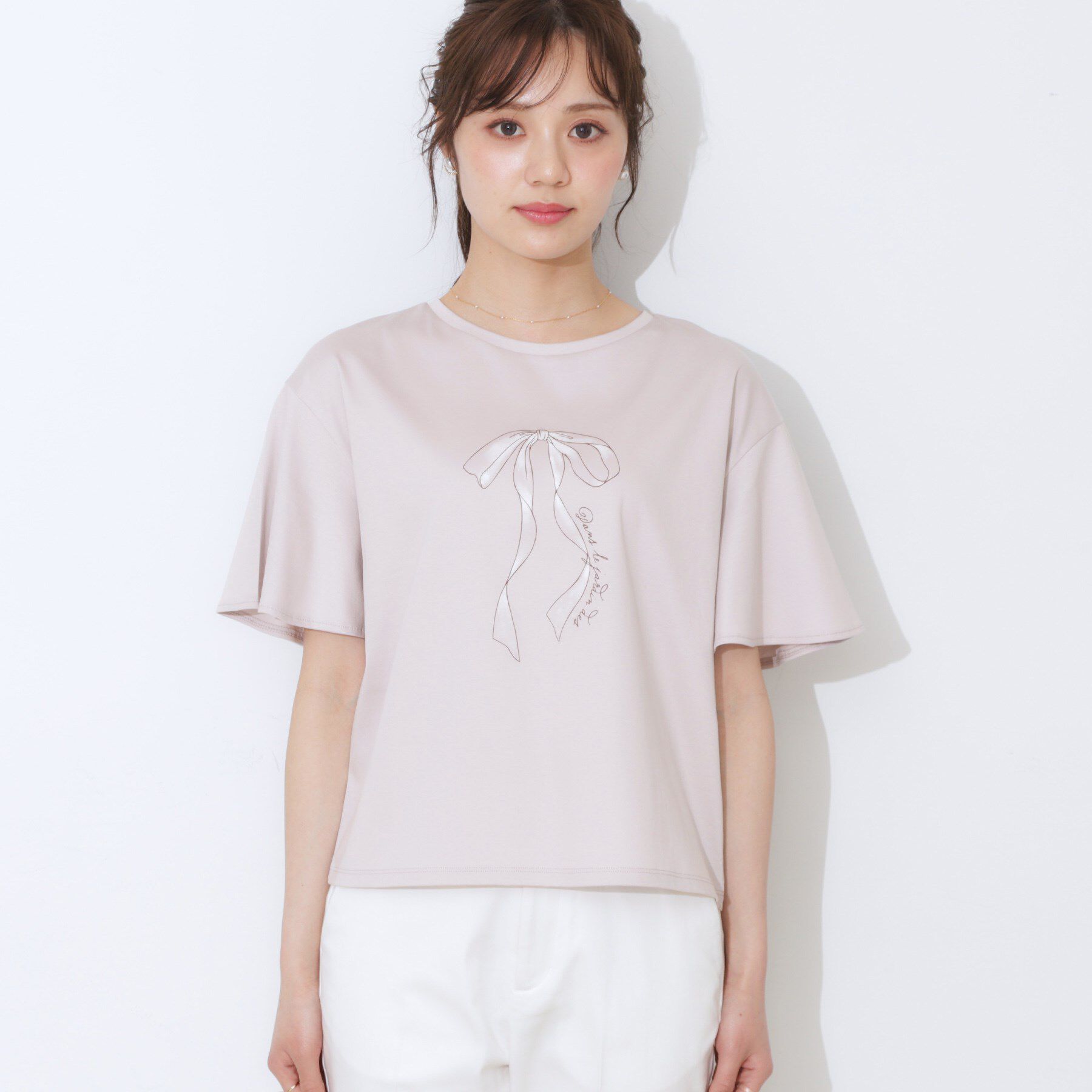 Couture broach「【マシンウォッシャブル・接触冷感・UV機能】60リボンロゴプリント フレアーT」|Tシャツ・カットソー|