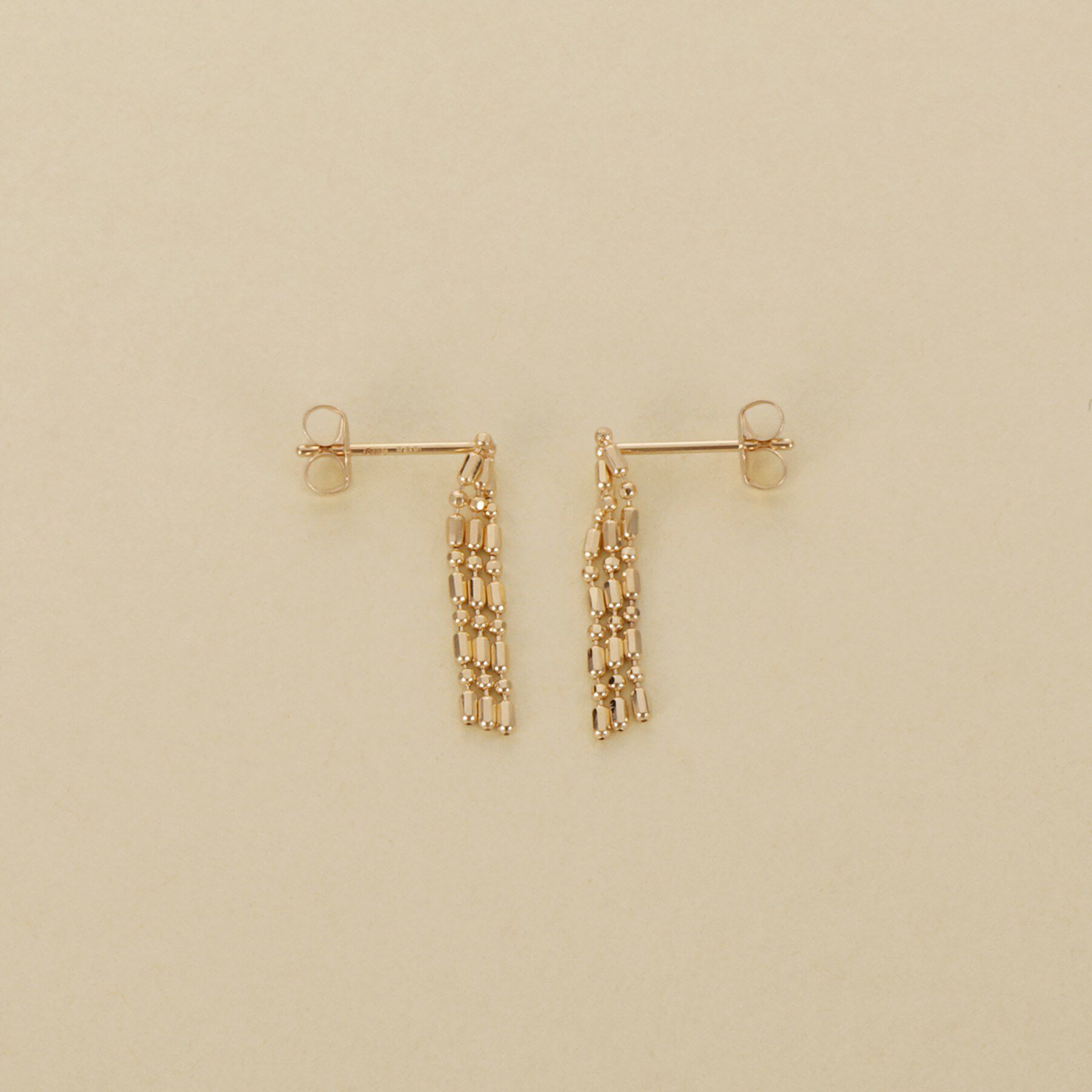 COCOSHNIK ONKITSCH「K10シリンダーチェーン フリンジピアス」|ピアス|
