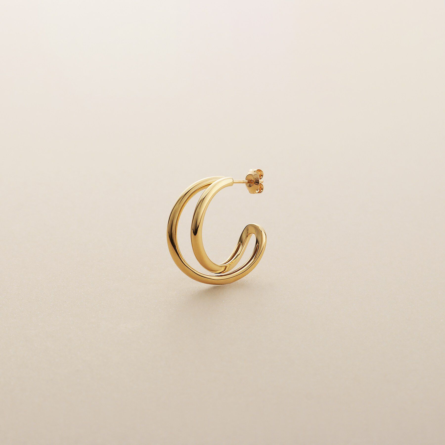 COCOSHNIK「K10クロッシングフープ スタッドピアス」|ピアス|